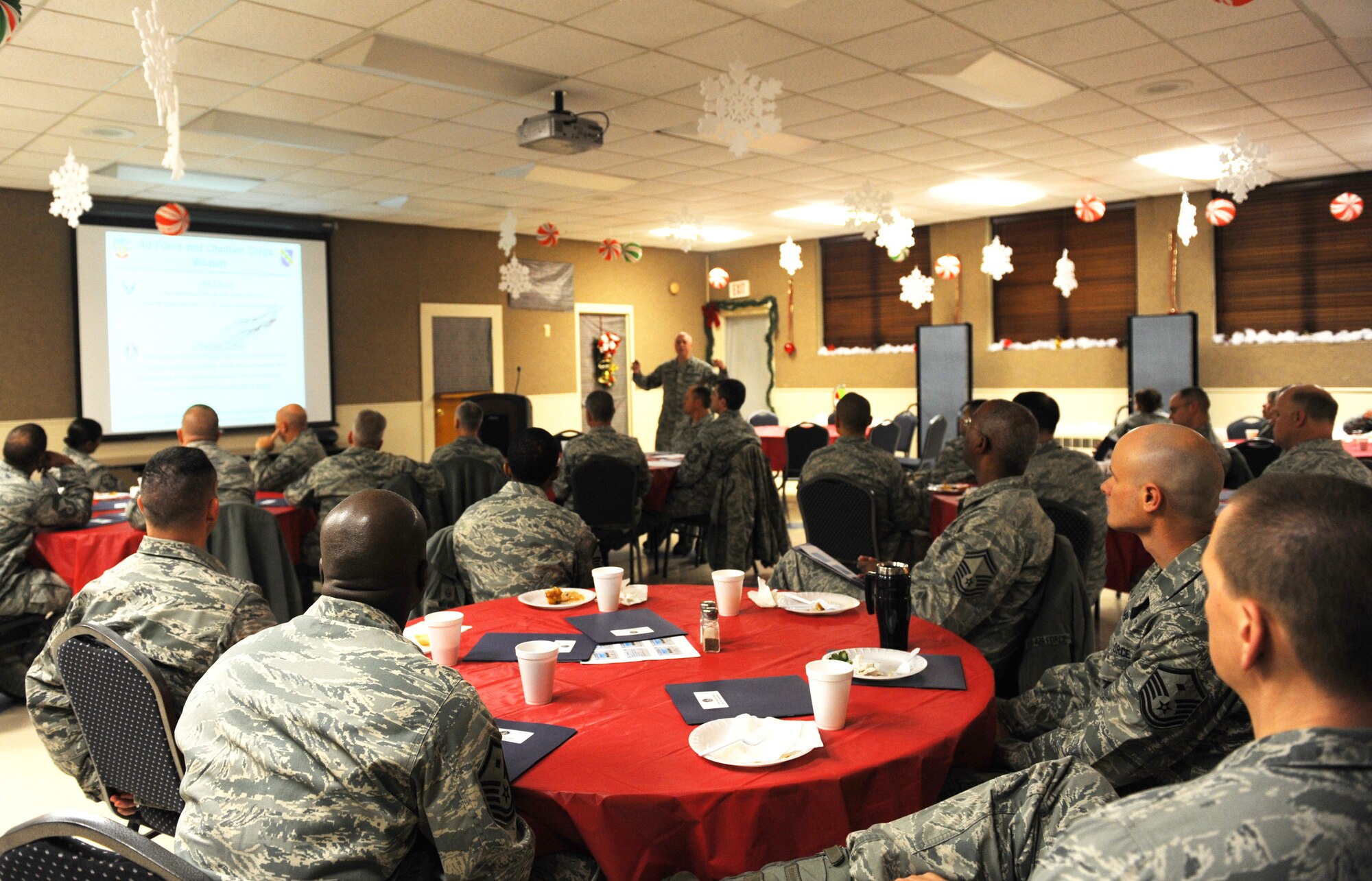 Dyess chiefs and first sergeants listen to a presentation given by Chaplain (Lt. Col.) Boyd Short at the base chapel Dec. 6, 2011, at Dyess Air Force Base, Texas. The chapel seeks to provide excellent spiritual help and encouragement for all military members and their families and to give counseling, advice or prayer. (U.S. Air Force photo by Airman 1st Class Cierra Bullock/Released)
