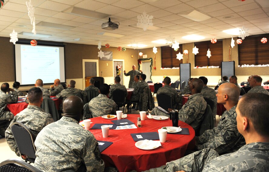 Dyess chiefs and first sergeants listen to a presentation given by Chaplain (Lt. Col.) Boyd Short at the base chapel Dec. 6, 2011, at Dyess Air Force Base, Texas. The chapel seeks to provide excellent spiritual help and encouragement for all military members and their families and to give counseling, advice or prayer. (U.S. Air Force photo by Airman 1st Class Cierra Bullock/Released)