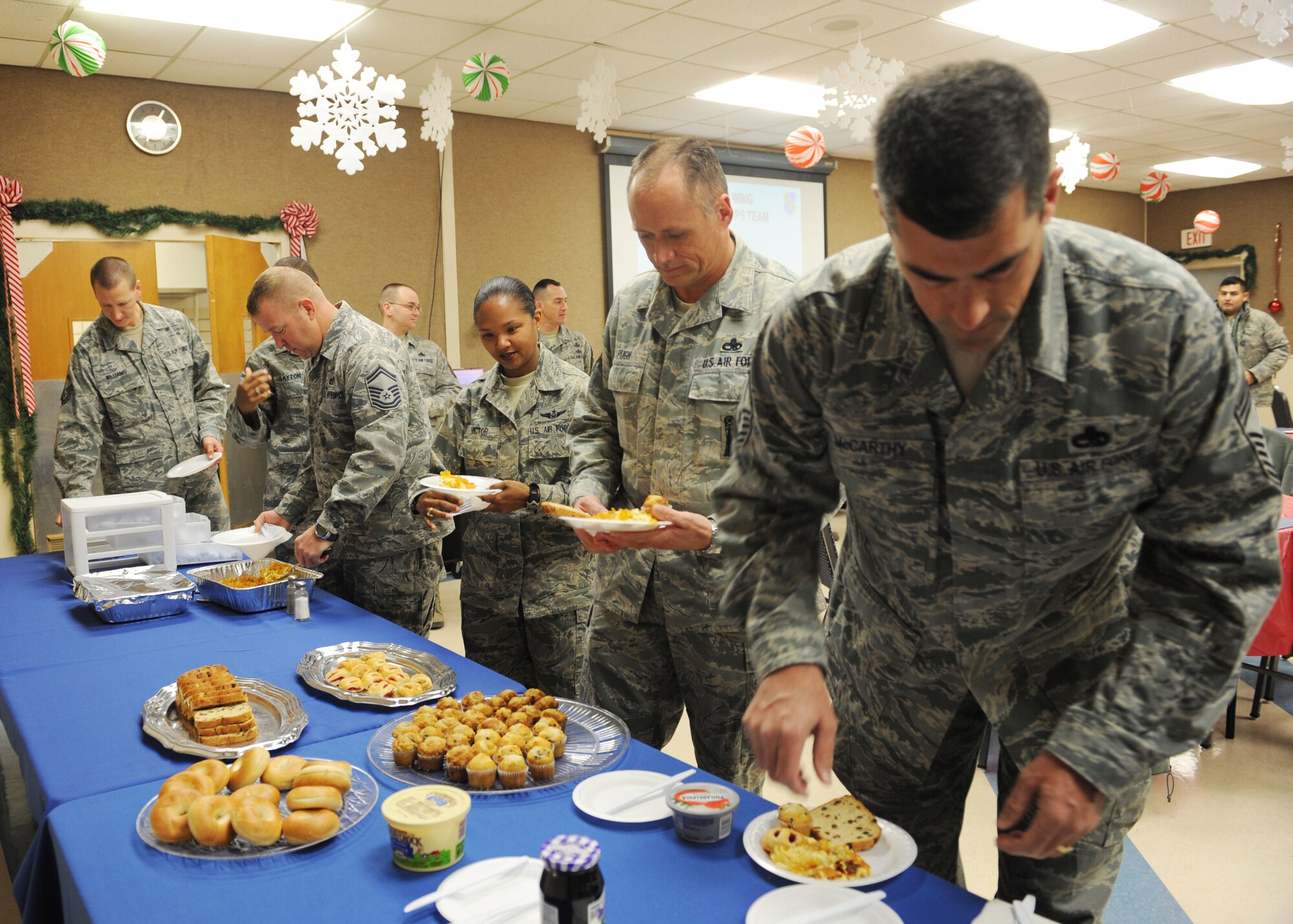 Dyess chapel staff provides food for chiefs and first sergeants during a chaplain corps team breakfast Dec. 6, 2011, at Dyess Air Force Base, Texas. The chapel seeks to provide excellent spiritual help and encouragement for all military members and their families and to give counseling, advice or prayer. (U.S. Air Force photo by Airman 1st Class Cierra Bullock/Released)