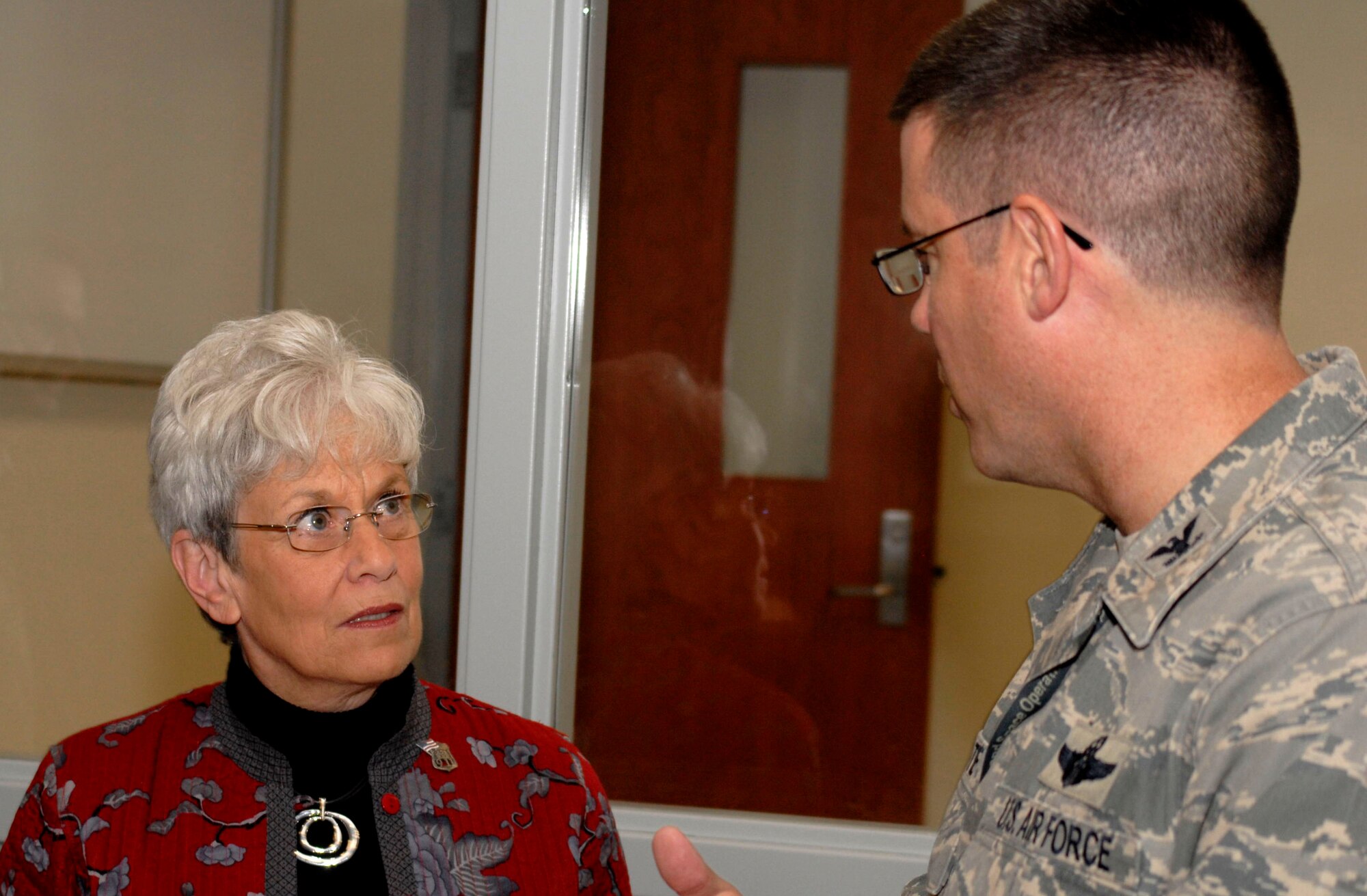 Connecticut Lieutenant Governor Nancy Wyman talks with Col. Peter DePatie, commander of the 103rd Air Operations Group, during a tour following a ribbon cutting ceremony for the group’s new operations facility at Bradley Air National Guard Base, East Granby, Conn., Dec. 3, 2011. (U.S. Air Force photo by Tech. Sgt. Tedd Andrews)