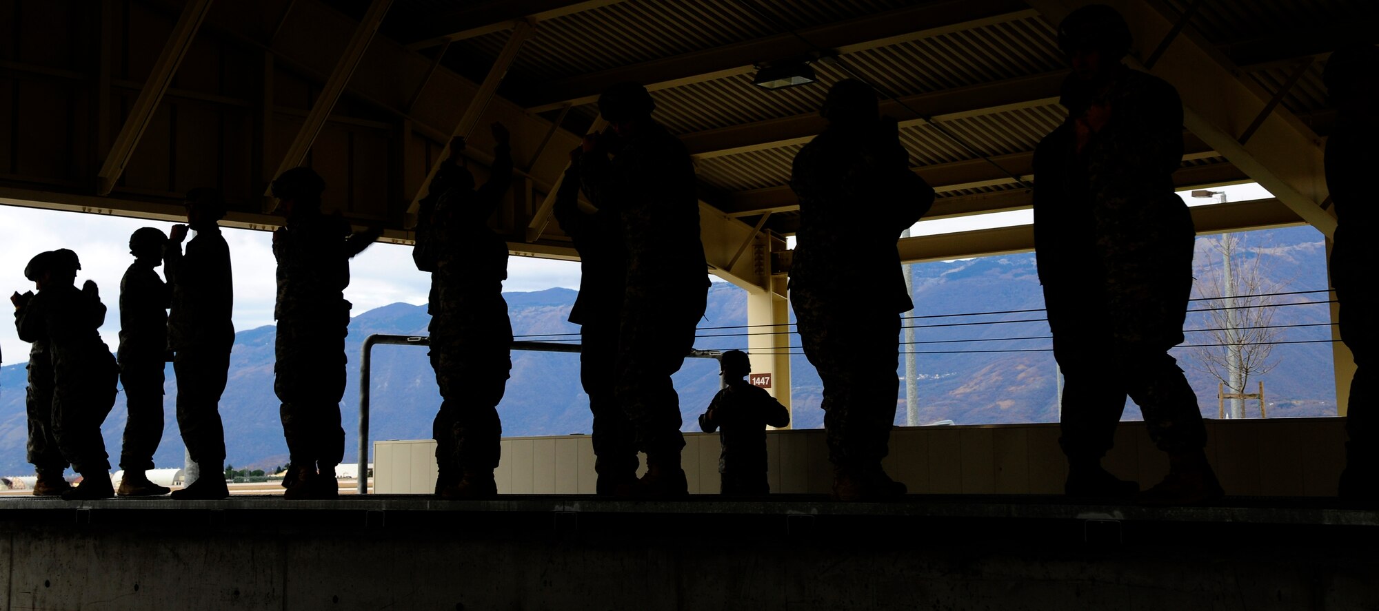 Soldiers with the 173rd Airborne Brigade Combat Team practice jumps Dec.6 at Aviano Air Base, Italy. Military paratroopers are required to perform four practice falls before conducting static line jumps from any aircraft. (U.S. Air Force photo/Airman 1st Class Briana Jones)
