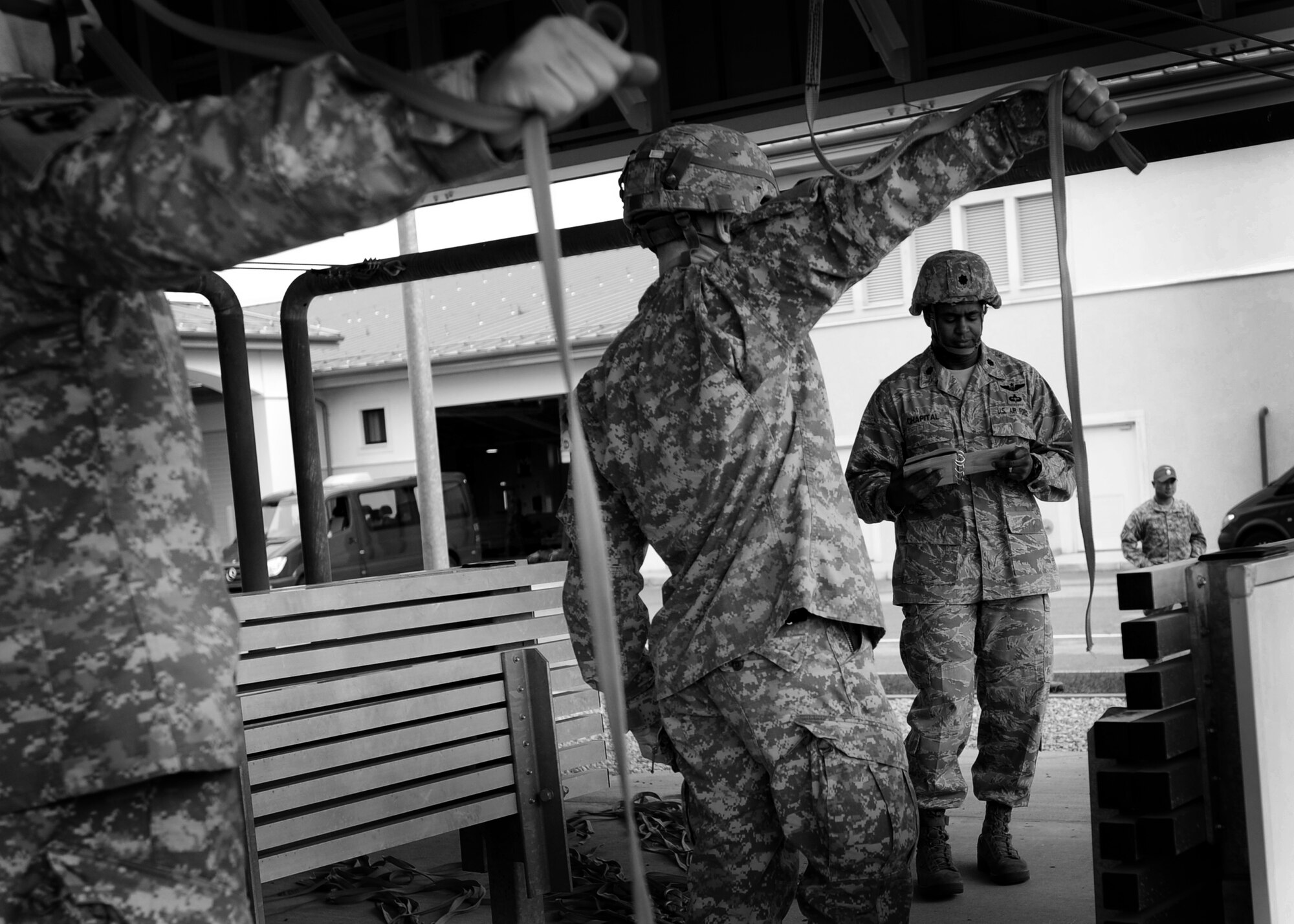 Lt. Col. Eric Chapital 8th Air Support Operations Squadron commander, gives instructions during a sustained training Dec. 6 at Aviano Air Base, Italy. The purpose of training is to review procedure points that should be followed while performing jumps.  (U.S. Air Force photo/Staff Sgt. Evelyn Chavez
