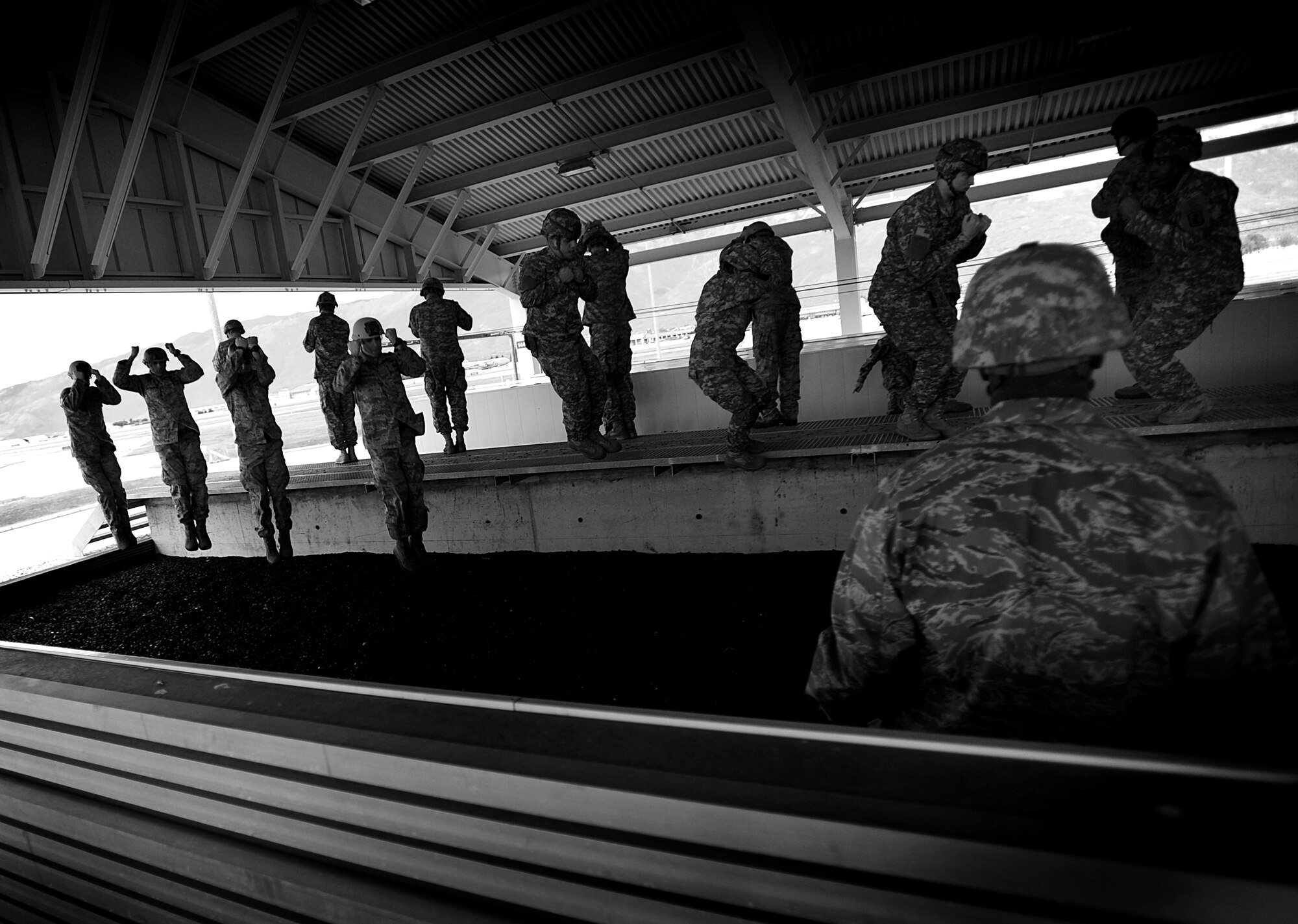Soldiers with the 173rd Airborne Brigade Combat Team conduct a sustained training Dec. 6 at Aviano Air Base, Italy.  The training included safety awareness of static line jumps. (U.S. Air Force Photo/Staff Sgt Evelyn Chavez)