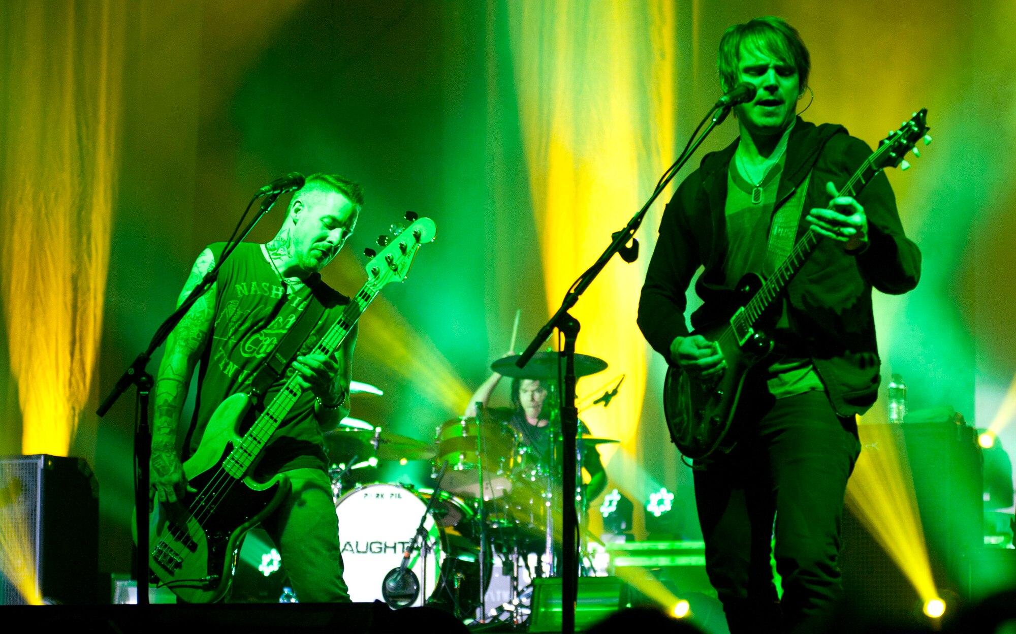 Bassist Josh Paul, left, and guitarist Brian Craddock, from the band Daughtry, play for Airmen and their families during an Operation Seasons Greetings Tour for Troops Dec. 6, 2011, at Incirlik Air Base, Turkey. The OSG is a 13-day, six-concert tour through Southwest Asia and Europe. (U.S. Air Force photo by Senior Airman Anthony Sanchelli/Released)

