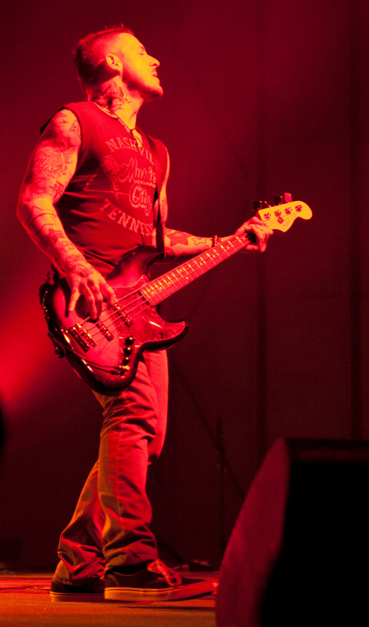Josh Paul, bassist for the band Daughtry, plays for Airmen and their families during an Operation Seasons Greetings Tour for Troops Dec. 6, 2011, at Incirlik Air Base, Turkey. The OSG is a 13-day, six-concert tour through Southwest Asia and Europe. (U.S. Air Force photo by Senior Airman Anthony Sanchelli/Released)
