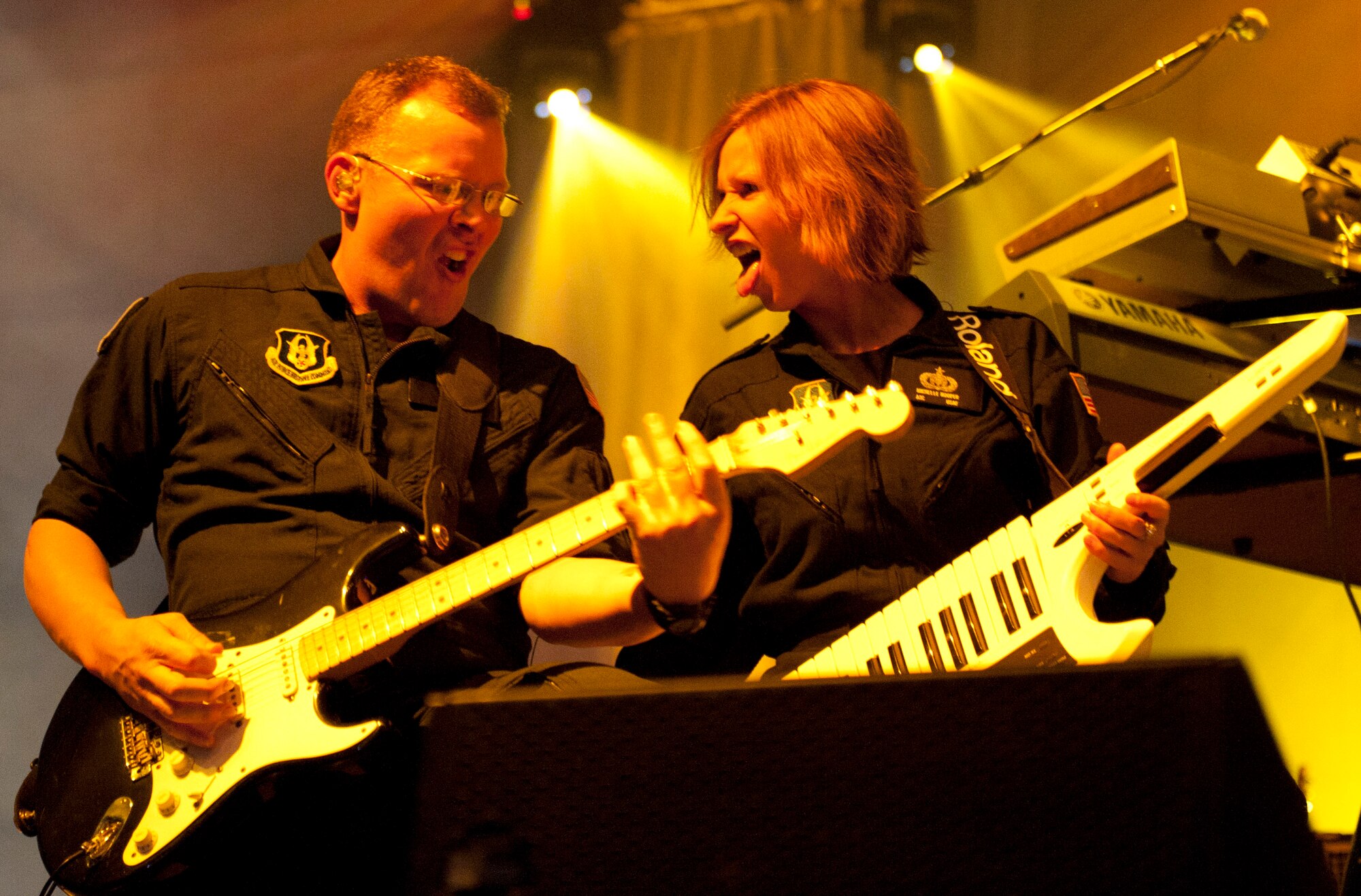 Members of Reserve Generation, Band of the U.S. Air Force Reserve, plays as the opening band for Daughtry and comedian Gabriel "Fluffy" Iglesias during an Operation Seasons Greetings Tour for Troops Dec. 6, 2011, at Incirlik Air Base, Turkey. The OSG is a 13-day, six-concert tour through Southwest Asia and Europe. (U.S. Air Force photo by Senior Airman Anthony Sanchelli/Released)