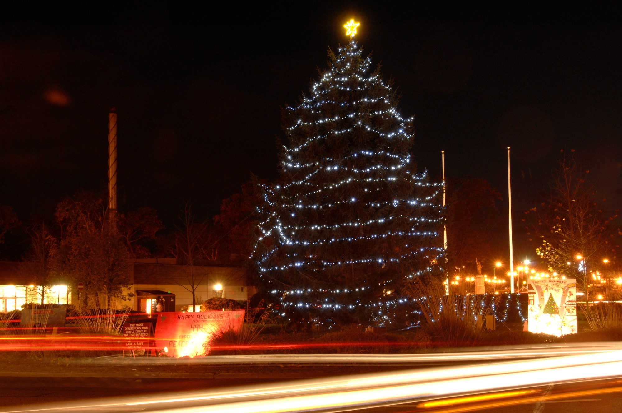 ROYAL AIR FORCE LAKENHEATH, England - The 48th Fighter Wing Christmas tree, lit in a ceremony held Dec. 2, 2011.  The tree-lighting ceremony included caroling, cookies, hot chocolate and a visit from Santa Claus. (U.S. Air Force photo by Staff Sgt. David Dobrydney)