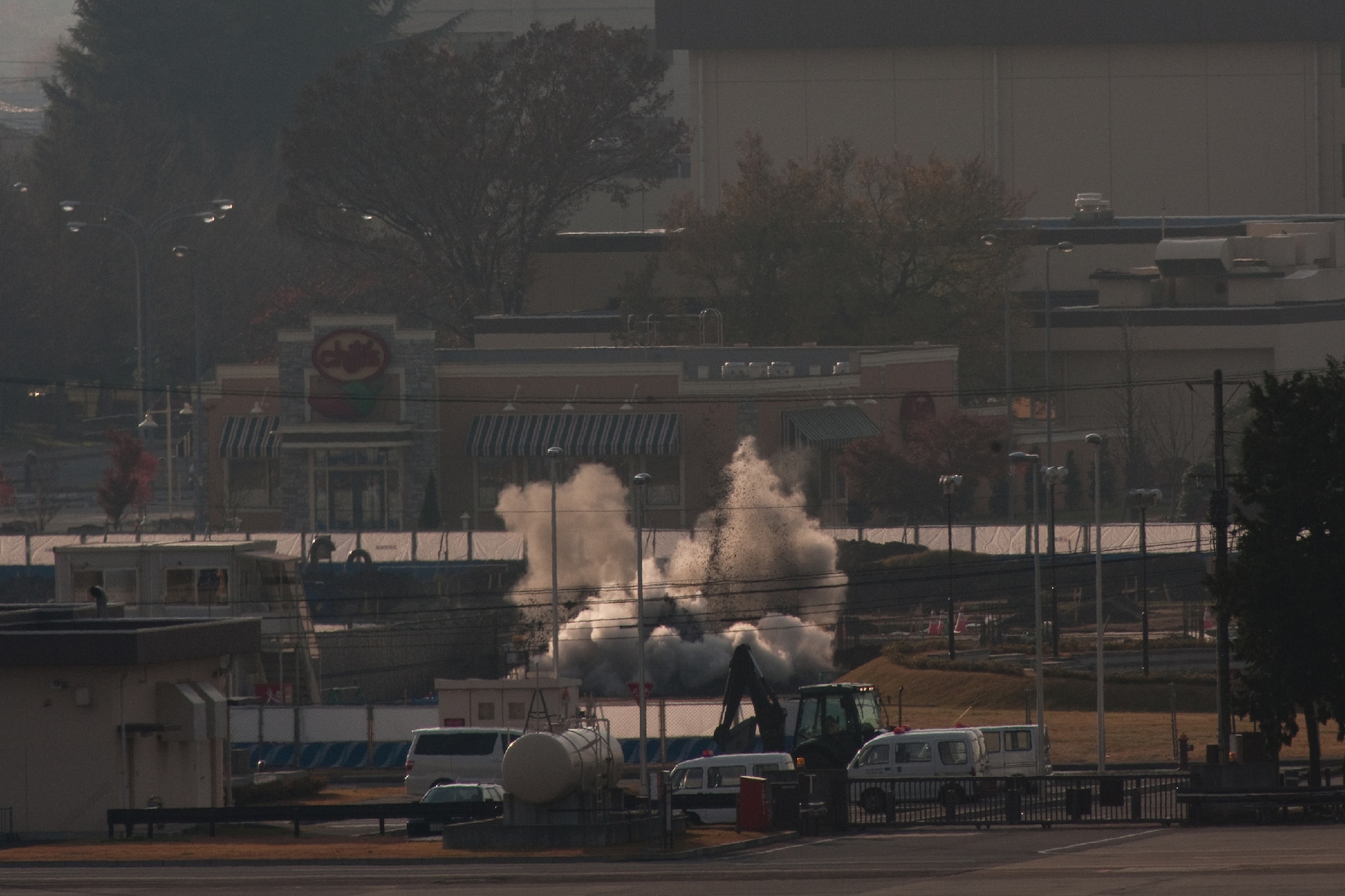 YOKOTA AIR BASE, Japan -- An explosive ordnance disposal team from Yokosuka Naval Air Station detonates an unexploded ordnance found at a construction site Dec. 7, 2011, at Yokota Air Base, Japan. (U.S. Air Force photo/Osakabe Yasuo)