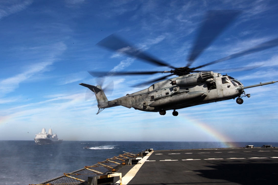 A CH-53E Super Stallion lands on the USNS Arctic during a simulated Expanded, Visit, Board, Search and Seizure, Dec. 7, 2011 The 24th MEU is currently taking part in Composite Training Unit Exercise (COMPTUEX), scheduled to take place Nov. 28 to Dec. 21. The training is meant to develop cohesion between the 24th MEU and Amphibious Squadron 8 (PHIBRON-8) in conducting amphibious operations, crisis response, and limited contingency operations while operating from the sea. The CH-53E helicopters are a detachment from HMH-464 based at Marine Corps Air Station New River, N.C., and comprise part of Marine Medium Tiltrotor Squadron VMM-261 (Rein), which is the Aviation Combat Element for the 24th MEU.