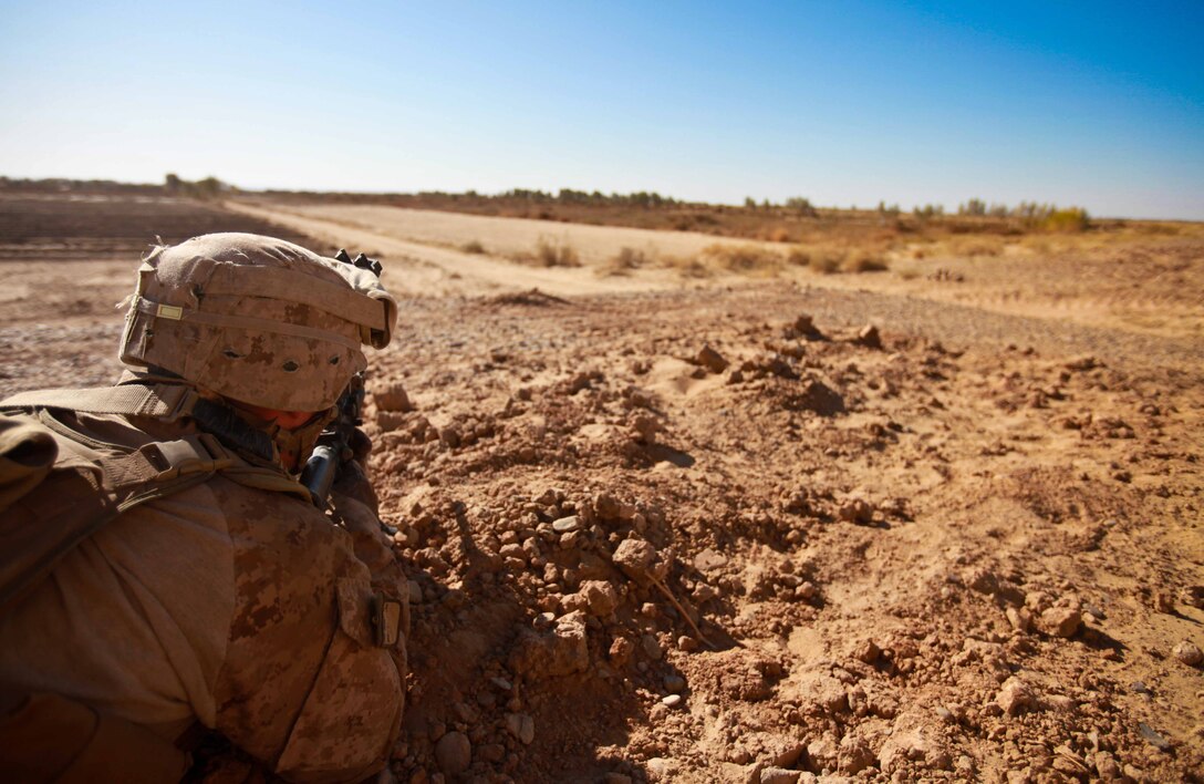 Ocoee, Fla., native Cpl. David Gage provides security outside a compound.  The 2006 Ocoee High School graduate served as an enlisted advisor with Team 1, Border Advisor Team 1, during Operation Eagle Hunt.  Gage’s shares his experience as a military policeman with the Afghan Border Policemen he mentors.