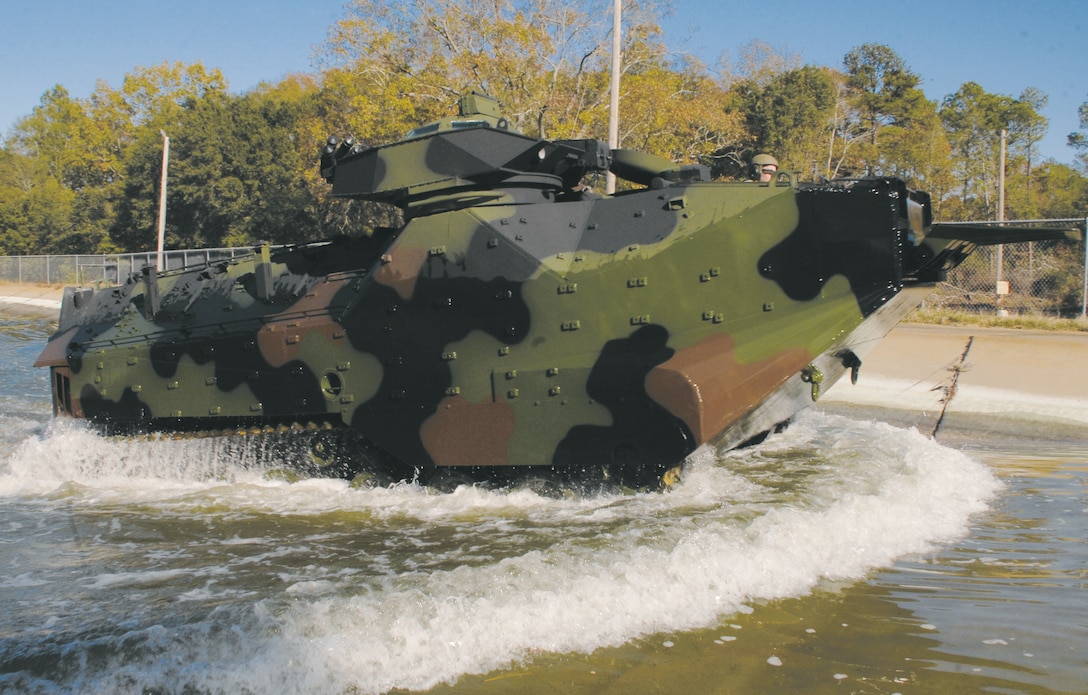 An amphibious assault vehicle proves its seaworthiness during testing at Maintenance Center Albany’s Test Pool, Dec. 1. Robert ‘Cujo’ Terry, heavy mobile equipment supervisor, Cost Work Center 723B, Maintenance Center Albany, demonstrates its ability to conduct amphibious operations by taking the AAV for a ‘swim.’