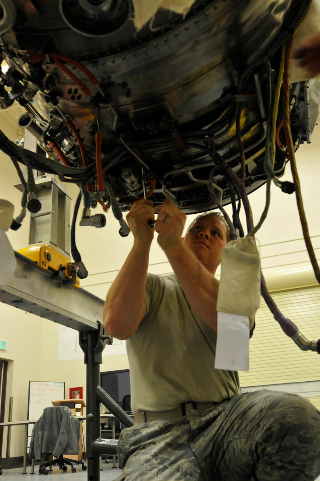 The F-119-100 Pratt and Whitney engine, 16.5 feet long, weighs 5000 pounds, costs 10 million dollars. Only half of the power plant for a F-22 "Raptor" fighter. Tech Sgt. Dan Oden, origionally from Anchorage, returns as a instructor for the 32nd Training Squadron, Detachment 14, on Joint Base Elmendorf-Richardson. Oden has 13 years experiance with engines for F-15 and the F-22 fighters.