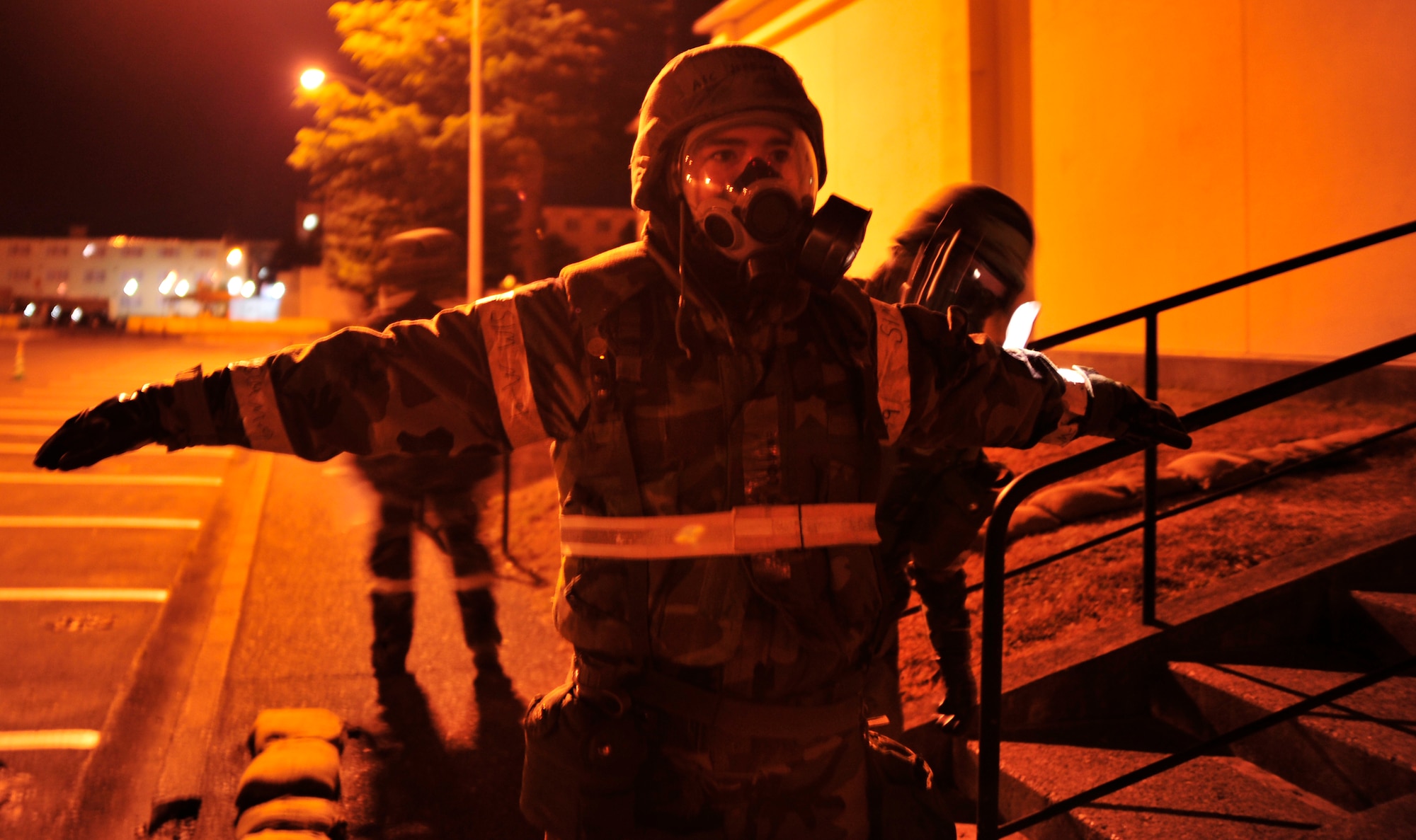 MISAWA AIR BASE, Japan – Senior Airman Mitchell Wheaton, 35th Communications Squadron, checks for simulated contamination on Airman 1st Class Jeremy Donahue after a post-attack reconnaissance sweep during an operational readiness inspection here Dec. 7. Members of the 35th Fighter Wing are going through an ORI to test airmen's deployment capabilities. (U.S. Air Force photo/Airman 1st Class Kaleb Snay)