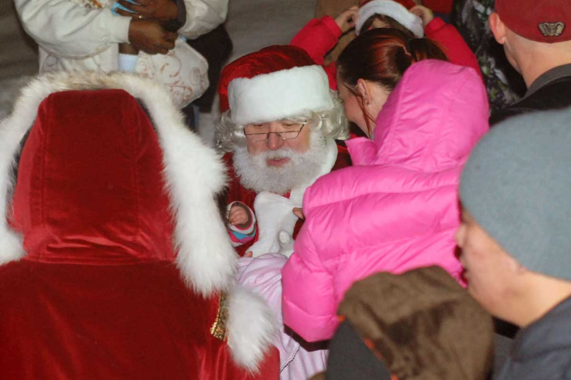 Santa greets children at USARAK Dec. 1.  (U.S. Army photos/Staff Sgt. Matthew Winstead)