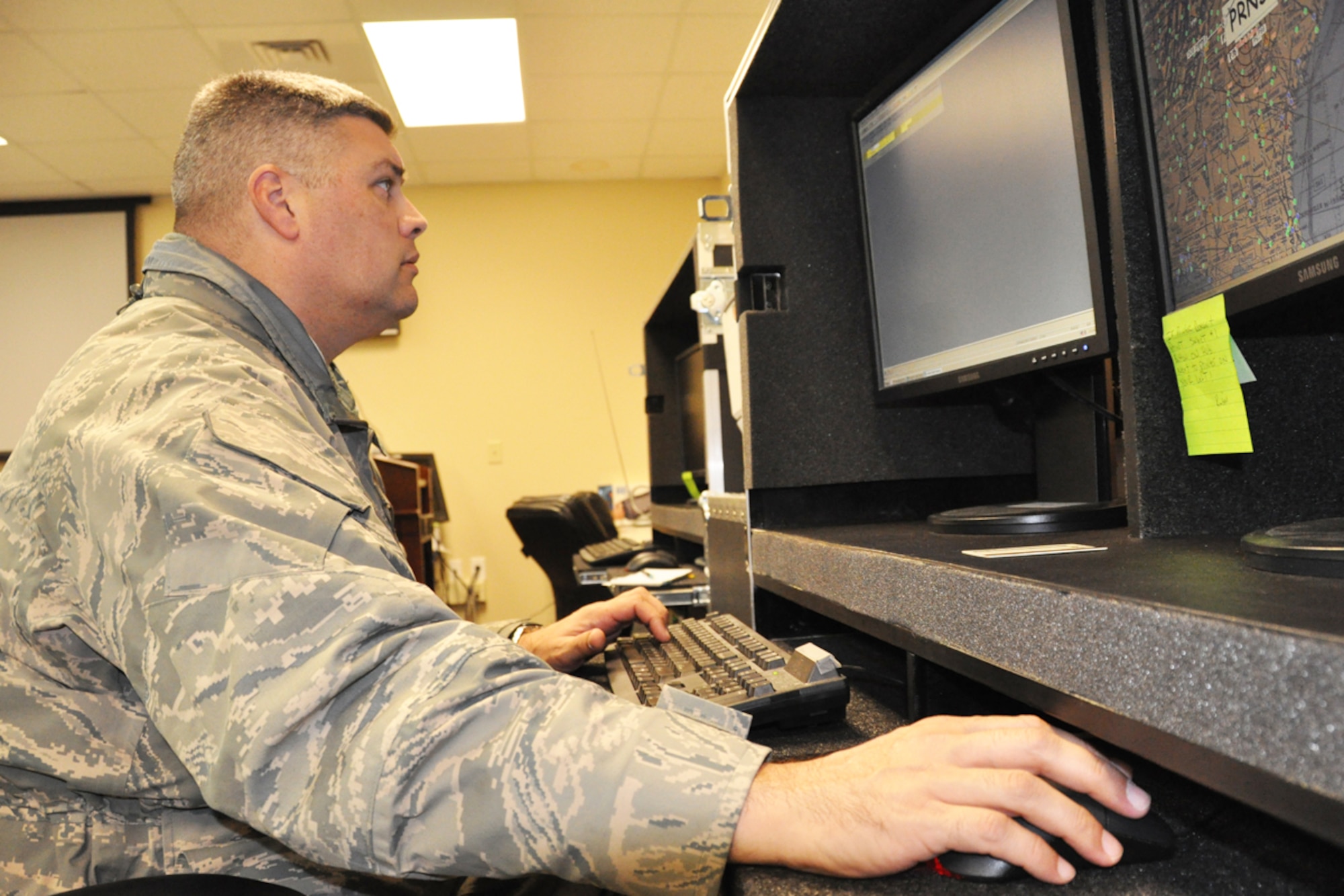 Maj. Robert Light, assistant director of operations, 700th Airlift Squadron uses Combat Flight Planning Software (CGPS) to map directions and decide which “roads” in the sky to use during preparation to participate in the 14th Annual Randy Oler Memorial Operation Toy Drop, taking place just outside of Fort Bragg, N.C. Dec 10. “There are roads in the sky, similar to highways on the ground,” said Light. This is the second year that Dobbins ARB is participating in the toy drop. Approximately 1600 paratroopers from the U.S. Army Civil Affairs and Psychological Operations Command, 18th Airborne Corps and visiting paratroopers from across the nation will parachute from Dobbins’ C-130 aircraft and deliver new, unwrapped toys to be distributed to local children's homes and social service agencies. (U.S. Air Force photo/Senior Airman Christina Bozeman)