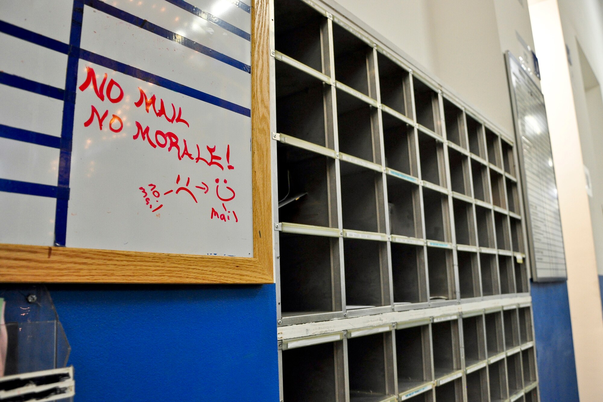 “No mail, no morale” is their slogan and during this time of year mail is more important than ever. The Military Postal Service Agency here processes about 3,000 pieces of mail a day during the holiday season, and there is a lot that goes into “pitching” mail. (U.S. Air Force photo/Tech. Sgt. Chad Thompson)
