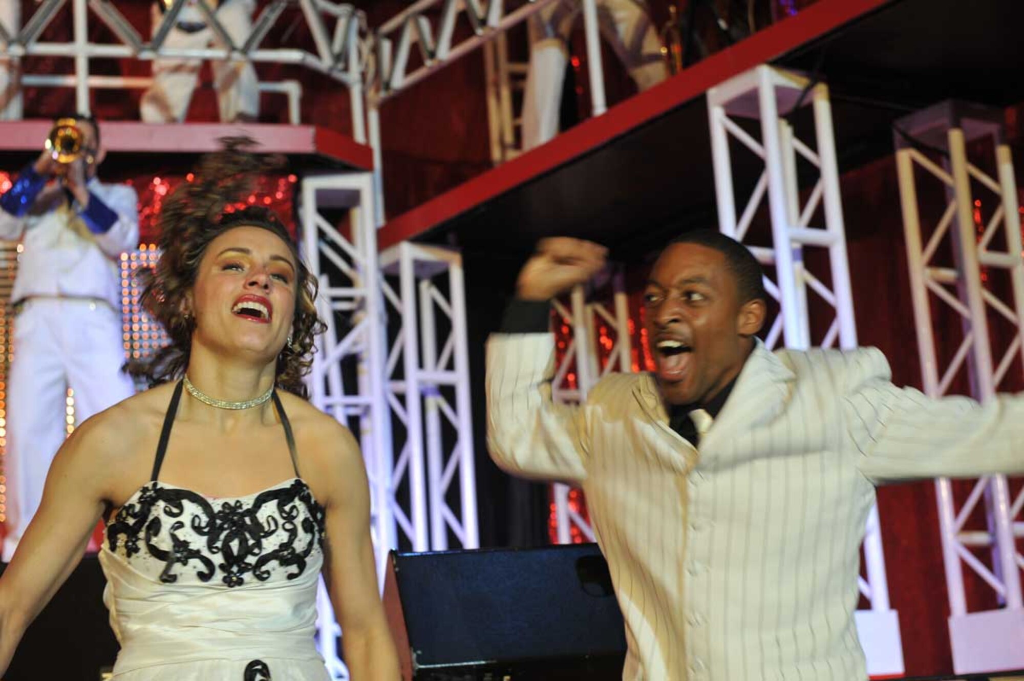 Air Force Staff Sgt. Derek Speights (right) and Senior Airman Alexandria Salinas performs a ‘50s dance number at the Talkeetna Theater Monday. Speights is from Chesapeake,Va. and Salinas is from Hopkinsville, Ky. (U.S. Air Force photo/Airman 1st Class Ty-Rico Lea)