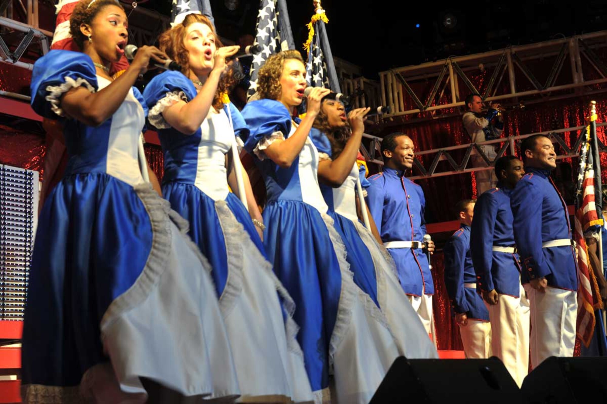 Tops in Blue members perform a Yankee Doodle medley at the Talkeetna Theater Monday. Tops in Blue is the traditional Air Force show which travels the globe entertaining Airmen with melodies and  choreography. (U.S. Air Force photo/Airman 1st Class Ty-Rico Lea)