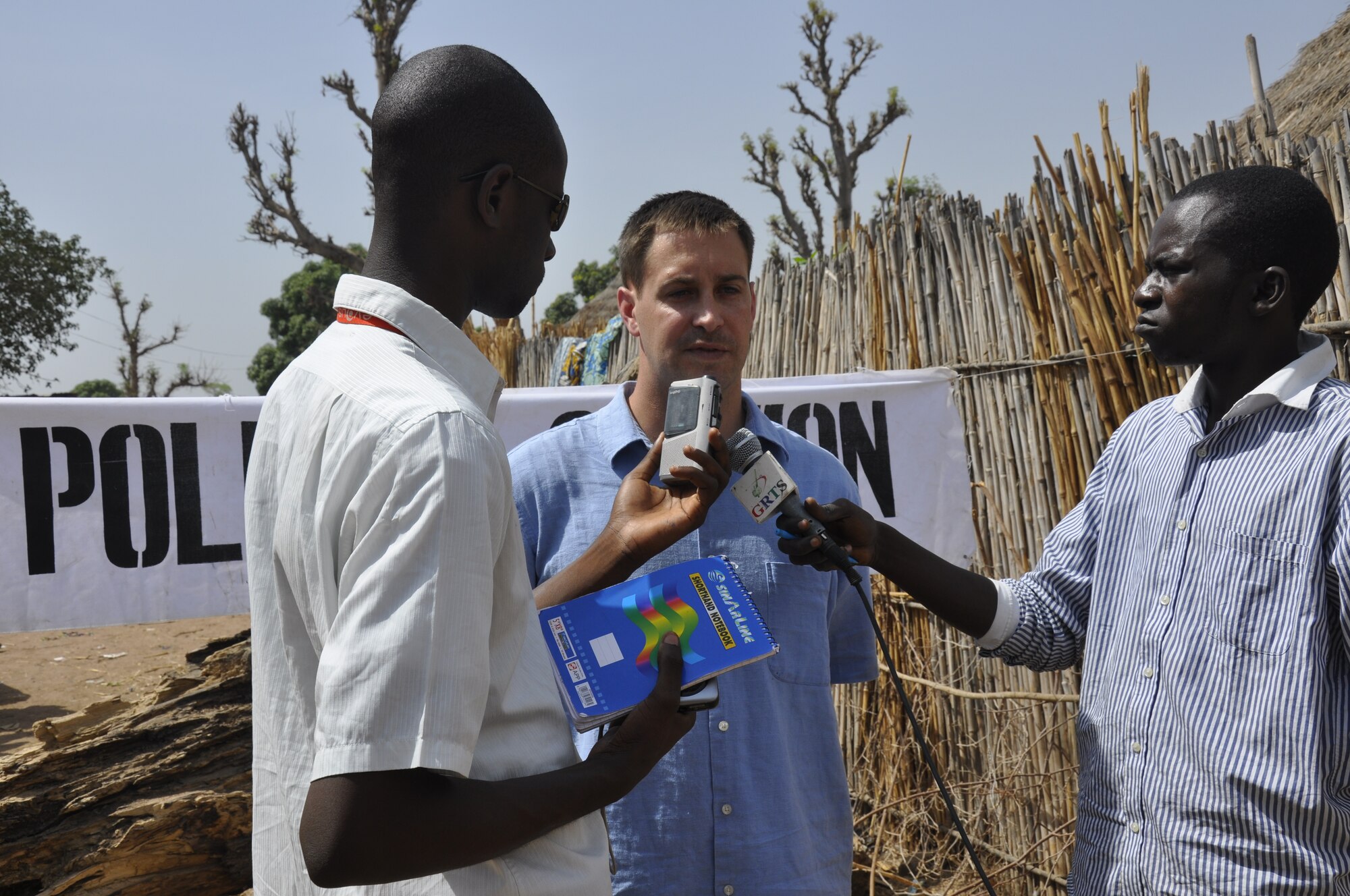 Maj. J. Marshall Preston, (center) a political-military affairs
strategist, is interviewed by national media after observing local elections
in The Gambia in April 2011.  Preston was in The Gambia as part of the
Embassy Immersion Program. (Courtesy photo)
