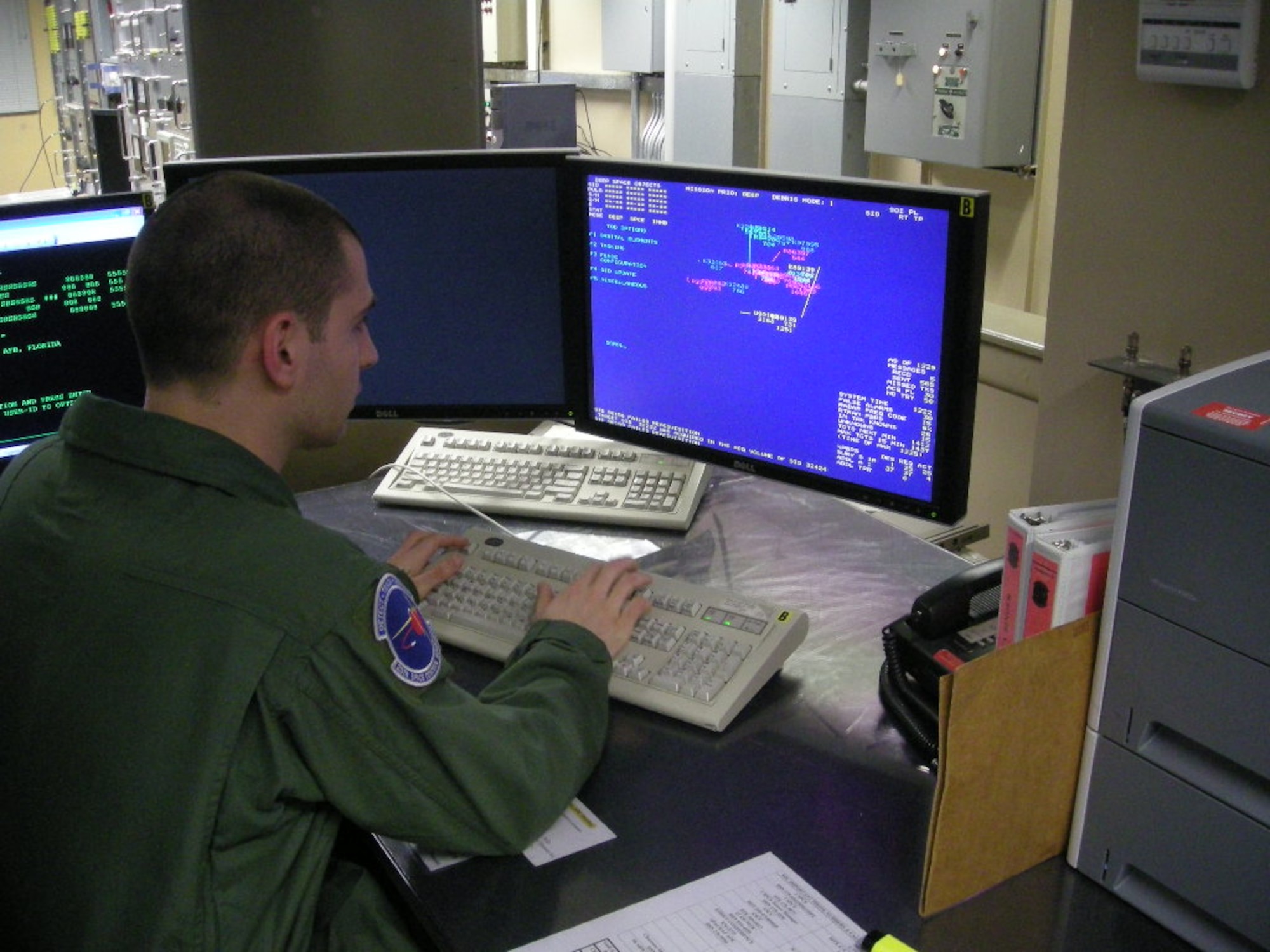 A 20th SPCS space control operator monitors information from the radar at Eglin, AFB recently. Every number on the monitor represents an object the radar is tracking. Using different keystrokes, the space console operator can direct the radar to track what the Joint Space Operations Center needs to maintain space situational awareness. (U.S. Air Force photo)