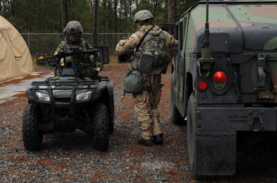 U.S. Airmen respond to an emergency during a phase II operational readiness exercise at Moody Air Force Base, Ga., Dec. 7, 2011. The ORE consists of simulated events that mimic situations faced in a deployed location. (U.S. Air Force photo by Airman 1st Class Olivia Dominique/Released)
