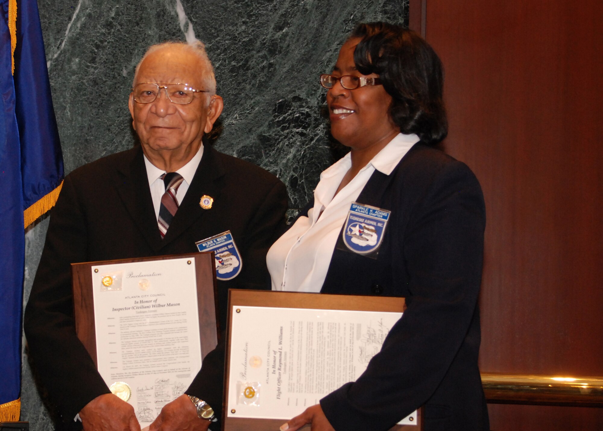 Atlanta Chapter Tuskegee Airmen members, Mr. Wilbur Mason, an Atlanta-area Tuskegee Airmen who served during World War II, and retired Air Force Reserve Master Sgt. Sparkle Adams, who served with the 94th Airlift Wing, were in attendence at the Atlanta City Council’s Proclamation Ceremony that honored Atlanta’s Tuskegee Airmen.  (U.S. Air Force photo/Master Sgt. Stan Coleman)