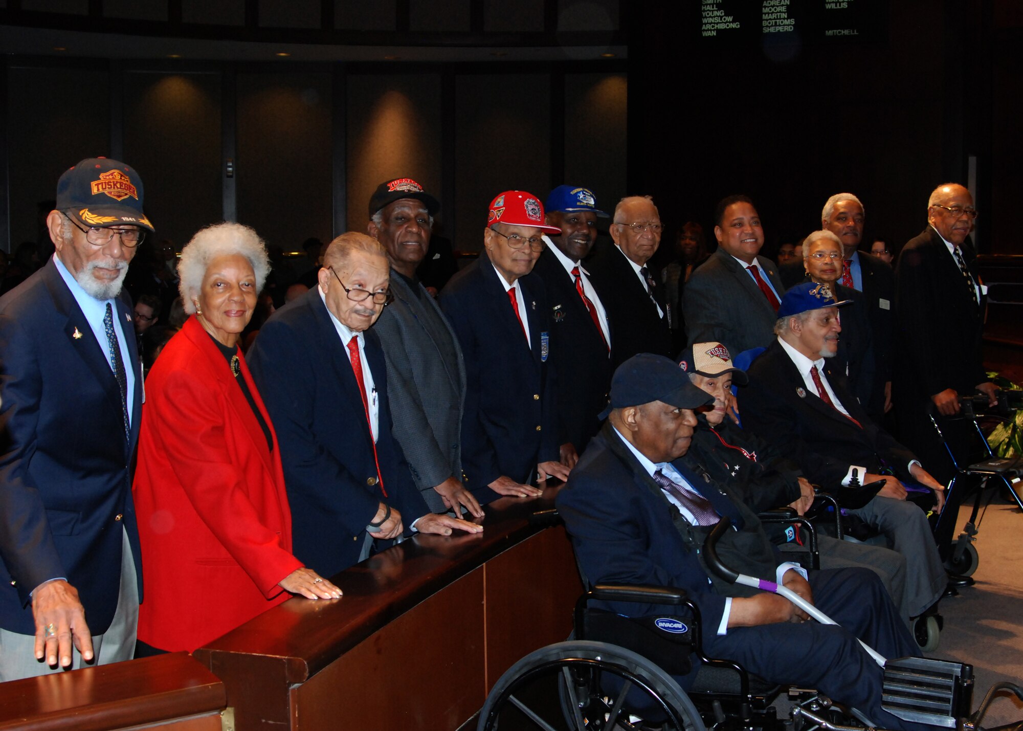Atlanta Chapter Tuskegee Airmen were honored on Dec. 5 by the Atlanta City Council for their military service during World War II.  TAI members and guests pictured in photo are: (left to right) Val Archer, Irma Dryden, Edward Johnson, Leroy Eley, Hiram Little, Earl Martin, Wilbur Mason, Atlanta City Councilman Michael Julian Bond, Sarah Plummer—a Tuskegee Airmen civilian, Georgia State Representative Roger Bruce, and James Patrick.  Seated in front are Tuskegee Airmen James Simpson, Norris Connally and Raymond Williams.  (U.S. Air Force photo/Master Sgt. Stan Coleman)