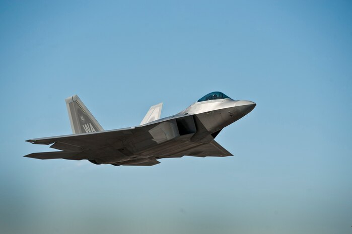 A U.S. Air Force F-22 Raptor takes off for a training mission during the U.S. Air Force Weapons School mission employment exercise Dec. 7, 2011, at Nellis Air Force Base, Nev. The two-week-long mission employment phase is the final part of a five-and-a-half-month Weapons School graduate course that showcases the students newly acquired skills to test their ability to plan, execute and lead complex missions. (U.S. Air Force photo by Airman 1st Class George Goslin/Released)