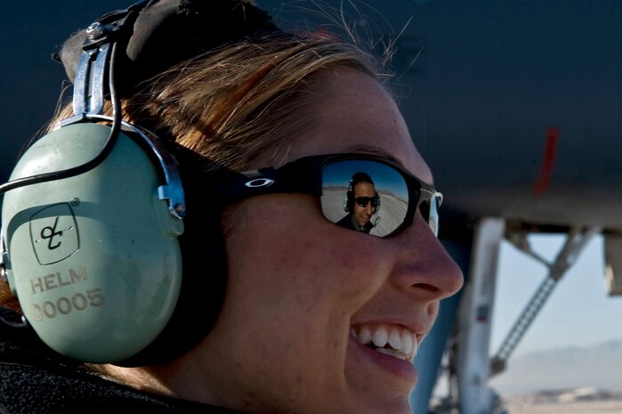 U.S. Air Force Staff Sgt. Courtney Helm, 7th Aircraft Maintenance Squadron aerospace propulsion craftsman, performs pre-flight inspections on a B-1 Lancer, 77th Weapons Squadron, Dyess Air Force Base, Texas, during the U.S. Air Force Weapons School mission employment exercise Dec. 7, 2011, at Nellis Air Force Base, Nev. The two-week-long mission employment phase is the final part of a five-and-a-half-month Weapons School graduate course that showcases the students newly acquired skills to test their ability to plan, execute and lead complex missions. (U.S. Air Force photo by Airman 1st Class Matthew Lancaster/Released)
