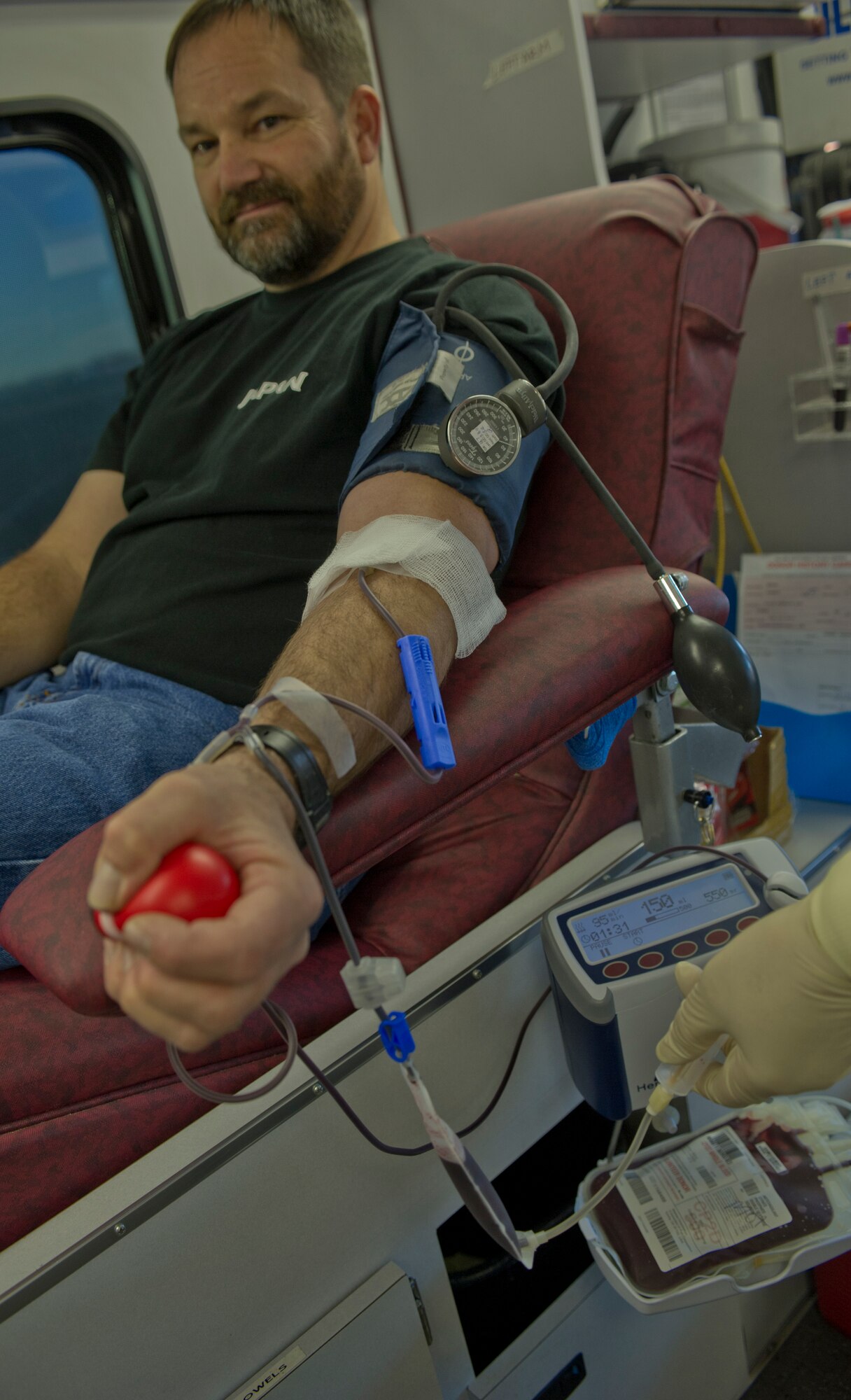 Mr. Robert Meyer, 92nd Force Support Squadron resource management "data guy", donates blood to the Inland Northwest Blood Center, Fairchild Air Force Base, Wash., Dec. 2, 2011. The Inland Northwest Blood Center saves lives by providing blood and services to support transfusion and transplantation medicine in the Inland Northwest. (U.S. Air Force photo by Airman 1st Class Tyirez Frost)