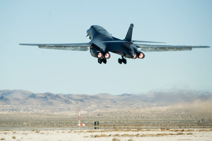 A U.S. Air Force B-1 Lancer, 77th Weapons Squadron, Dyess Air Force Base, Texas, takes off during the U.S. Air Force Weapons School mission employment exercise Dec. 5, 2011, at Nellis Air Force Base, Nev. The two-week-long mission employment phase is the final part of a five-and-a-half-month Weapons School graduate course that showcases the students newly acquired skills to test their ability to plan, execute and lead complex missions. (U.S. Air Force photo by Staff Sgt. Christopher Hubenthal/Released)