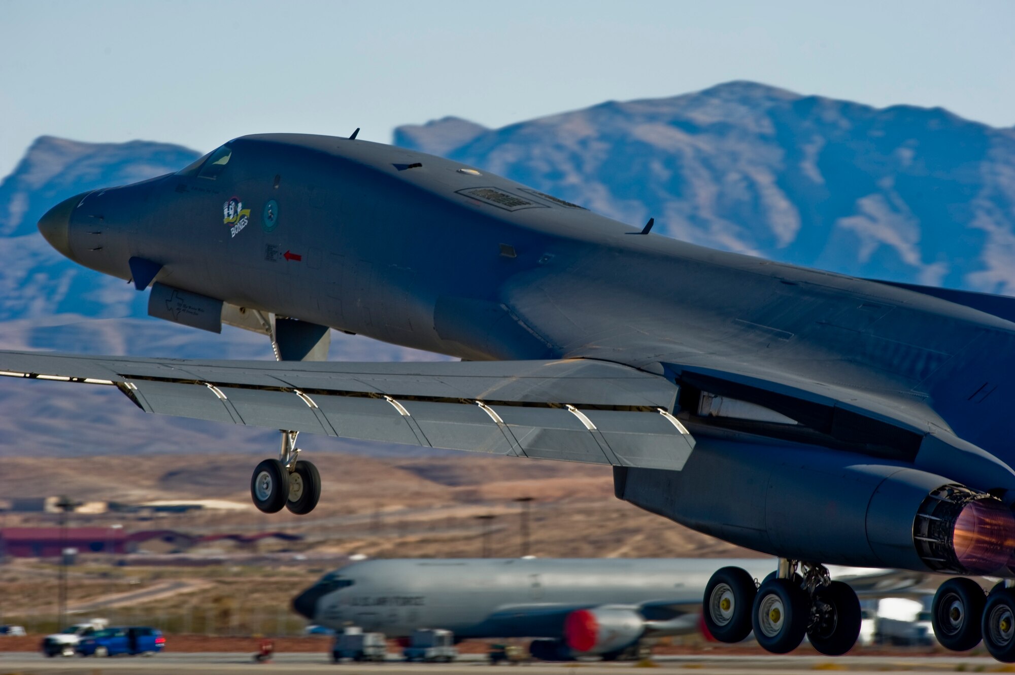 A U.S. Air Force B-1 Lancer, 77th Weapons Squadron, Dyess Air Force Base, Texas, takes off during the U.S. Air Force Weapons School mission employment exercise Dec. 5, 2011, at Nellis Air Force Base, Nev. The two-week-long mission employment phase is the final part of a five-and-a-half-month Weapons School graduate course that showcases the students newly acquired skills to test their ability to plan, execute and lead complex missions. (U.S. Air Force photo by Airman 1st Class Matthew Lancaster/Released)