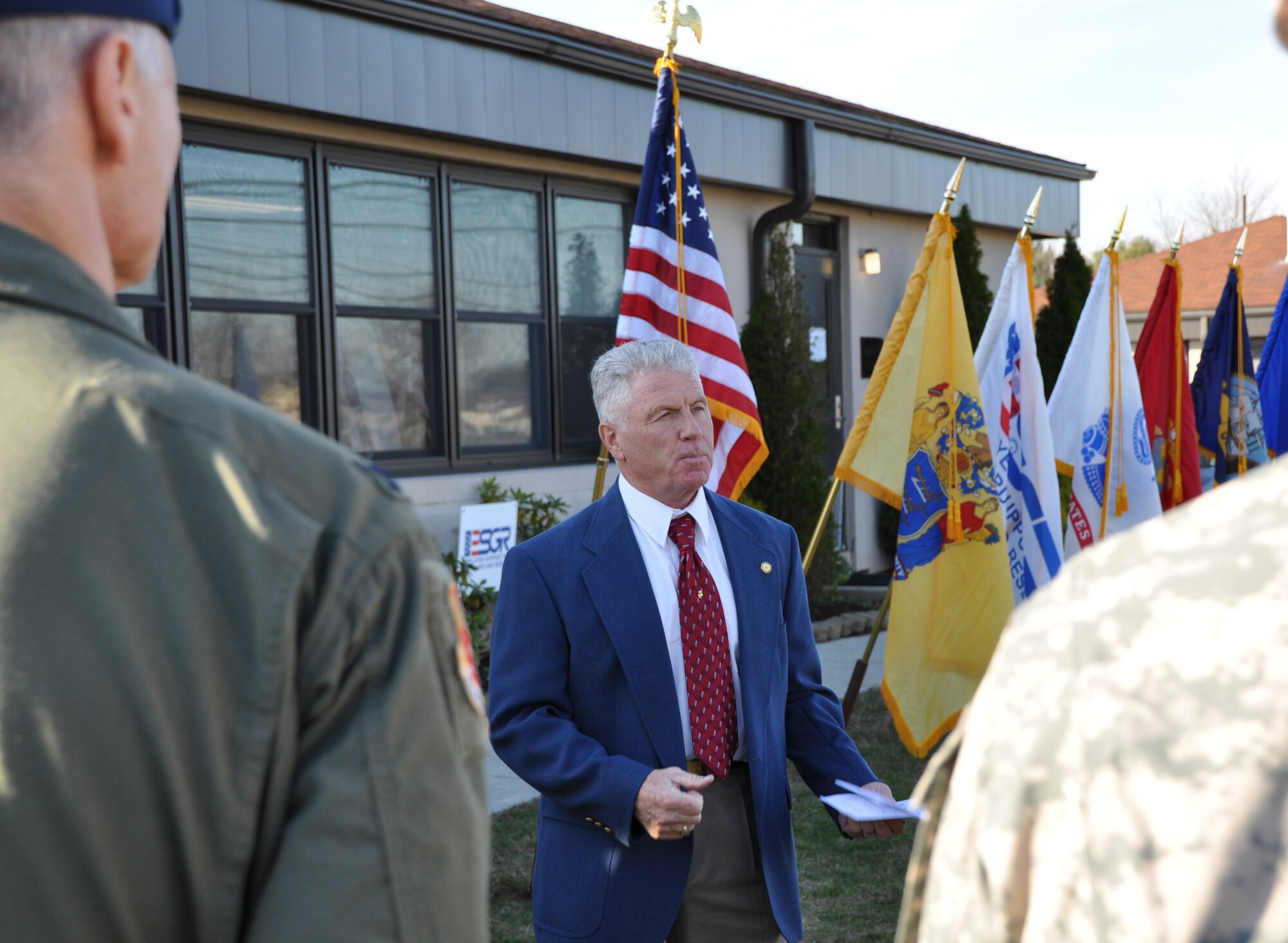 JOINT BASE MCGUIRE-DIX-LAKEHURST, N.J. - Alan Smith, New Jersey Employer Support of the Guard and Reserve state chair, addresses the audience Dec. 3 during the ribbon cutting ceremony for the official opening of the newest ESGR building, here.  The new location is at 5511 Texas Avenue making the Department of Defense organization more accessible to Guard and Reseve members. (U.S. Air Force photo/MSgt. Donna T. Jeffries)