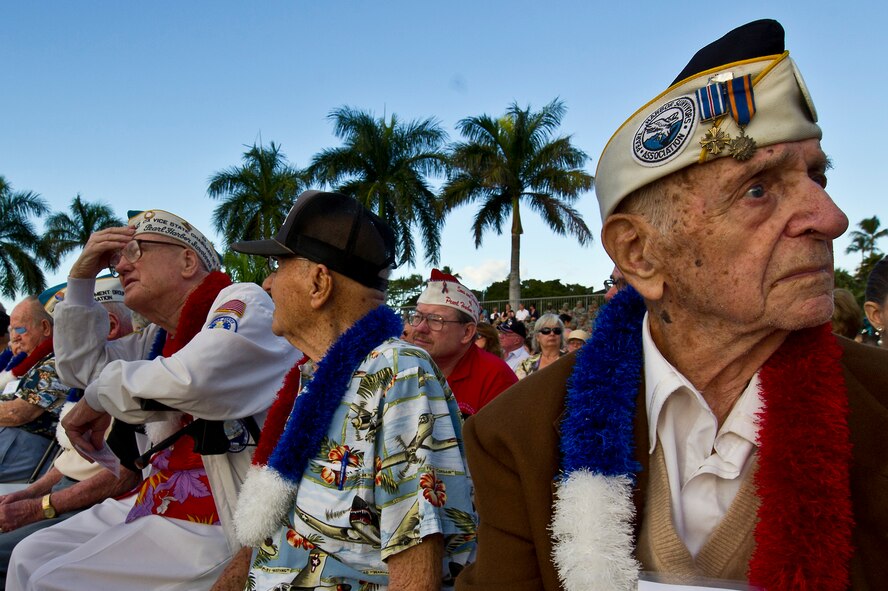 Army Air Corps Veteran, Louis Roffman waits for the Joint Base Pearl Harbor-Hickam remembrance ceremony to begin Dec. 7, 2011, at JBPHH.  Airmen, their families and veterans gathered at Atterbury Circle, the site of the same flagpole that stood during the Japanese attack Dec. 7, 1941. The ceremony was held to honor the survivors of the attacks and remember the 238 Army Air Corps Airmen who died defending Hickam Field. (U.S.  Air Force photo by Tech. Sgt. Michael R. Holzworth/Released)