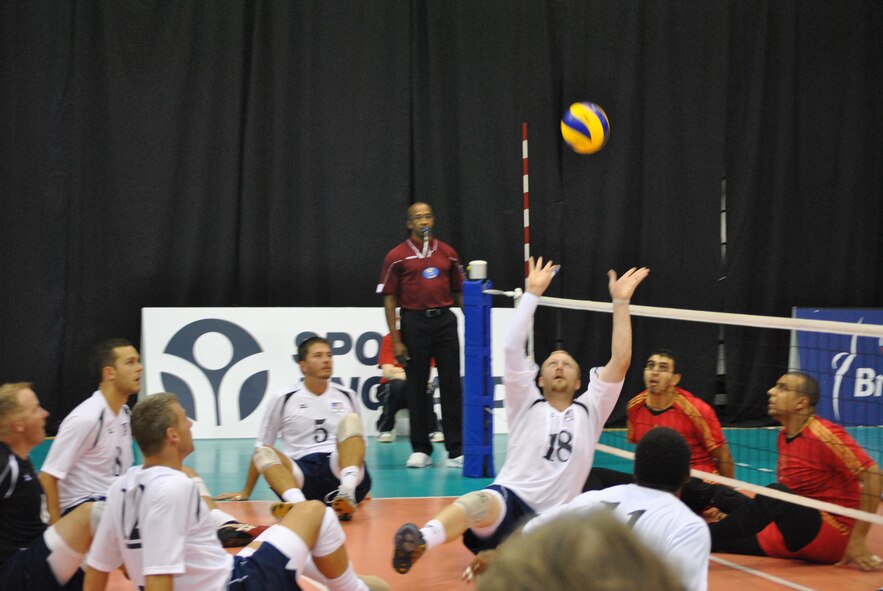 Tinker AFB employee J. Dee Marinko prepares to serve for the U.S. Men’s Sitting Volley Team in a match against Azerbaijan during the Continental Cup in Kettering, England, earlier this year. The Americans placed eighth in the competition. (Courtesy photo by Kate Fit)