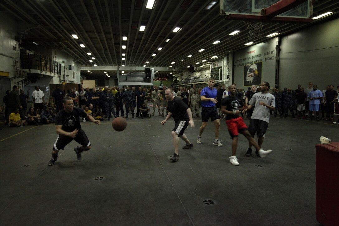 A Marine with 3rd MLG guides a medium tactical vehicle replacement truck onto a U.S. Navy Landing Craft Utility Dec. 9 to return it to shore. (U.S. Marine Corps photo by Sgt. Megan Angel/Released)