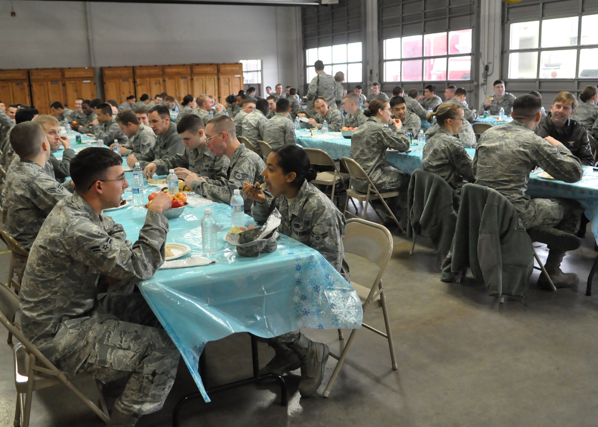 Airmen eat vegetables, turkey, mashed potatoes and more Dec. 9, 2011, during the fourth annual Unaccompanied Airmen Holiday Feast at Joint Base Lewis-McChord, Wash. (U.S. Air Force photo/Airman 1st Class Leah Young)