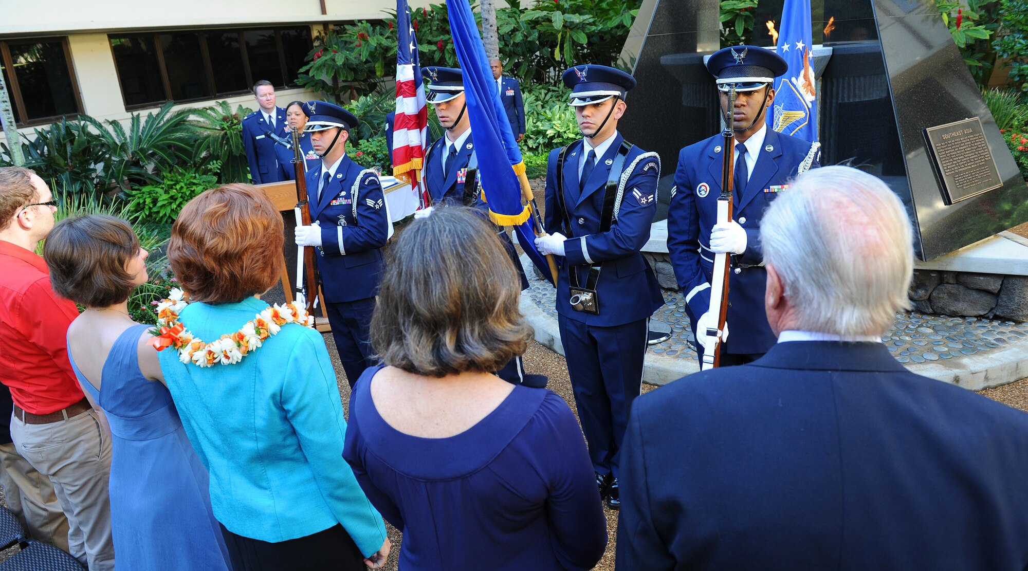 Base honor guard team members prepare to post the colors at the promotion ceremony for Lt. Gen. Jan-Marc Jouas, Pacific Air Forces director of operations, plans, requirements and programs, in the Courtyard of Heroes, PACAF Headquarters building, Joint Base Pearl Harbor-Hickam, Hawaii, Dec. 9, 2011. Jouas will move on to become the deputy commander, United Nations Command Korea; deputy commander, U.S. Forces Korea; commander, Air Component Command, Republic of Korea/U.S. Combined Forces Command; and commander, 7th Air Force, Pacific Air Forces, at Osan Air Base, South Korea. (U.S. Air Force photo/Tech. Sgt. Jerome S. Tayborn/Released)