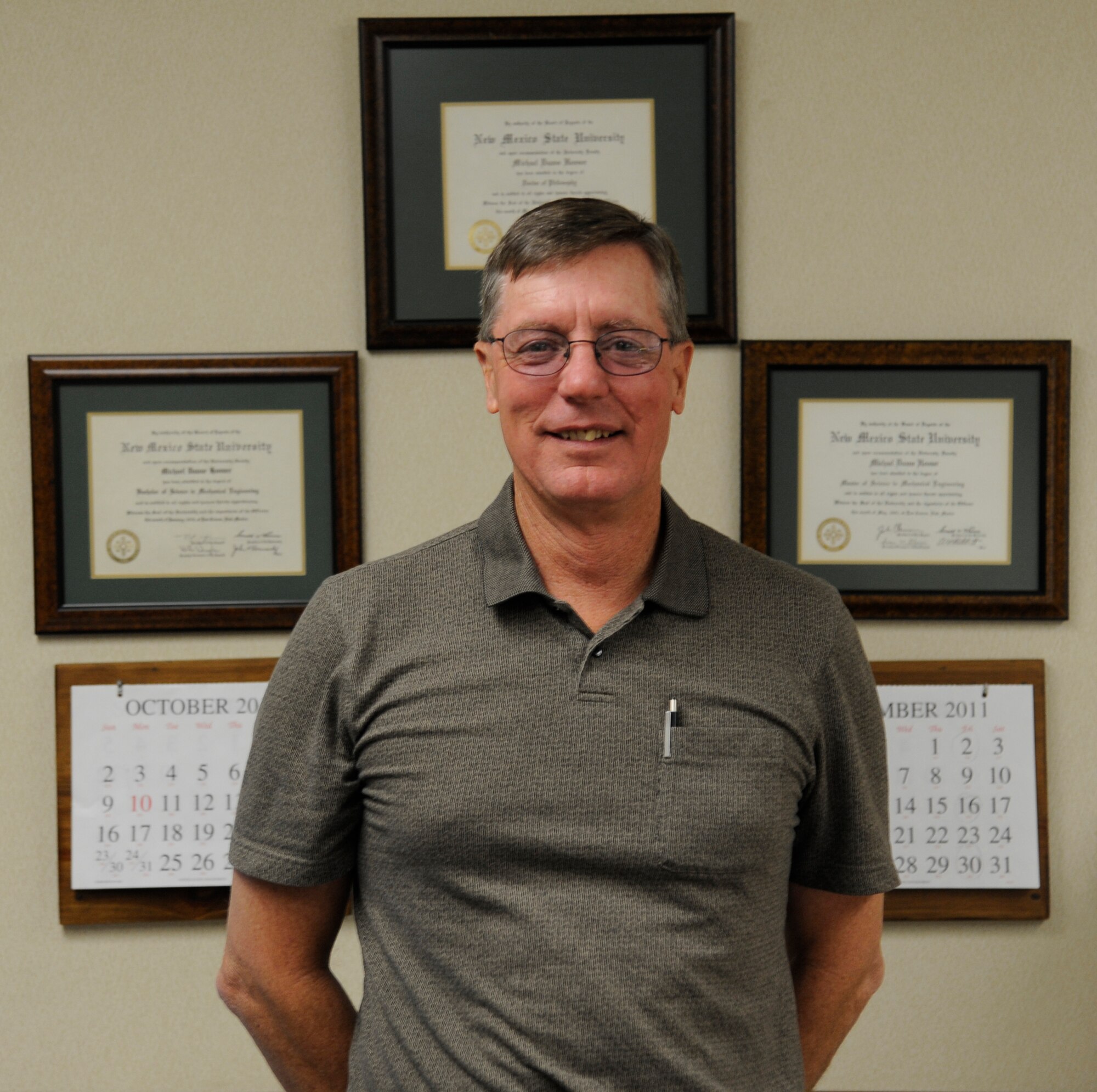 HOLLOMAN AIR FORCE BASE, N.M. -- Dr. Michael Hooser, 846th Test Squadron chief scientist, poses for a photo Dec. 8, 2011, at the 846th TS. Hooser was selected for the 2011 Harold Brown Award, the top Air Force award for scientific research and development, based on his work on the rain-field characterization testing and Magnetic Levitation system on the Holloman High Speed Test Track. (U.S. Air Force photo by Airman 1st Class Siuta B. Ika/Released)