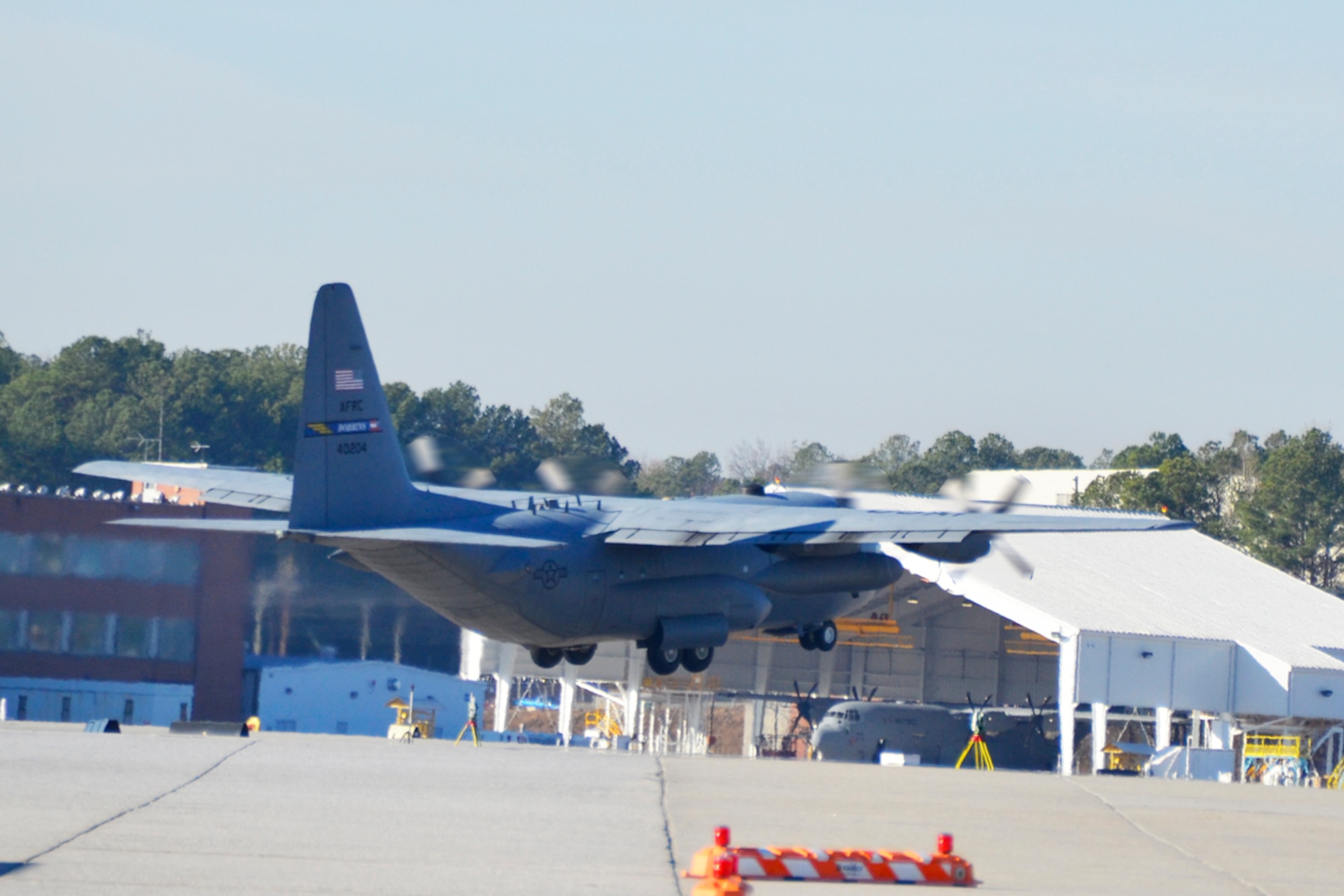 Dobbins C-130s loaded with 700th Airlift Squadron aircrew and members of the U.S.  Army 382nd Combat Camera, East Point, Ga., took flight in route to Fort Bragg, N.C. in support of Operation Toy Drop, taking place Dec. 10. Approximately 4000 paratroopers from the U.S. Army Civil Affairs and Psychological Operations Command, 18th Airborne Corps and visiting paratroopers from 11 countries will parachute from Dobbins’ and other aircraft and deliver new, unwrapped toys to be distributed to local children's homes and social service agencies. (U.S. Air Force photo/Master Sgt. James Branch)