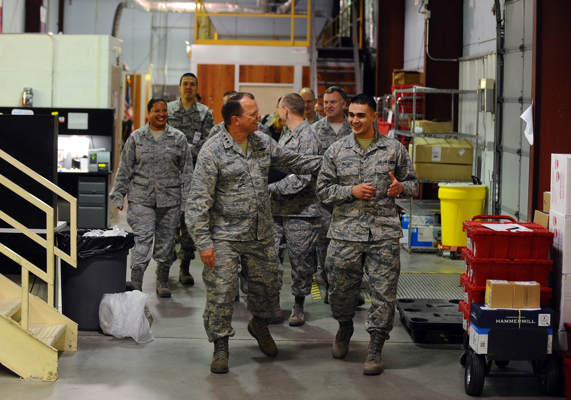 U.S. Air Force Surgeon General Lt. Gen. C. Bruce Green is welcomed by Staff Sgt. Rashad A. El-Jurdi to the medical logistics warehouse during the general's tour of Offutt's Ehrling Bergquist Clinic at Offutt Air Force Base, Neb., Dec. 1. The surgeon general had an opportunity to meet with Airman of the 55th Wing Medical Group during his tour of Offutt. (U.S. Air Force photo by Josh Plueger/Released).
