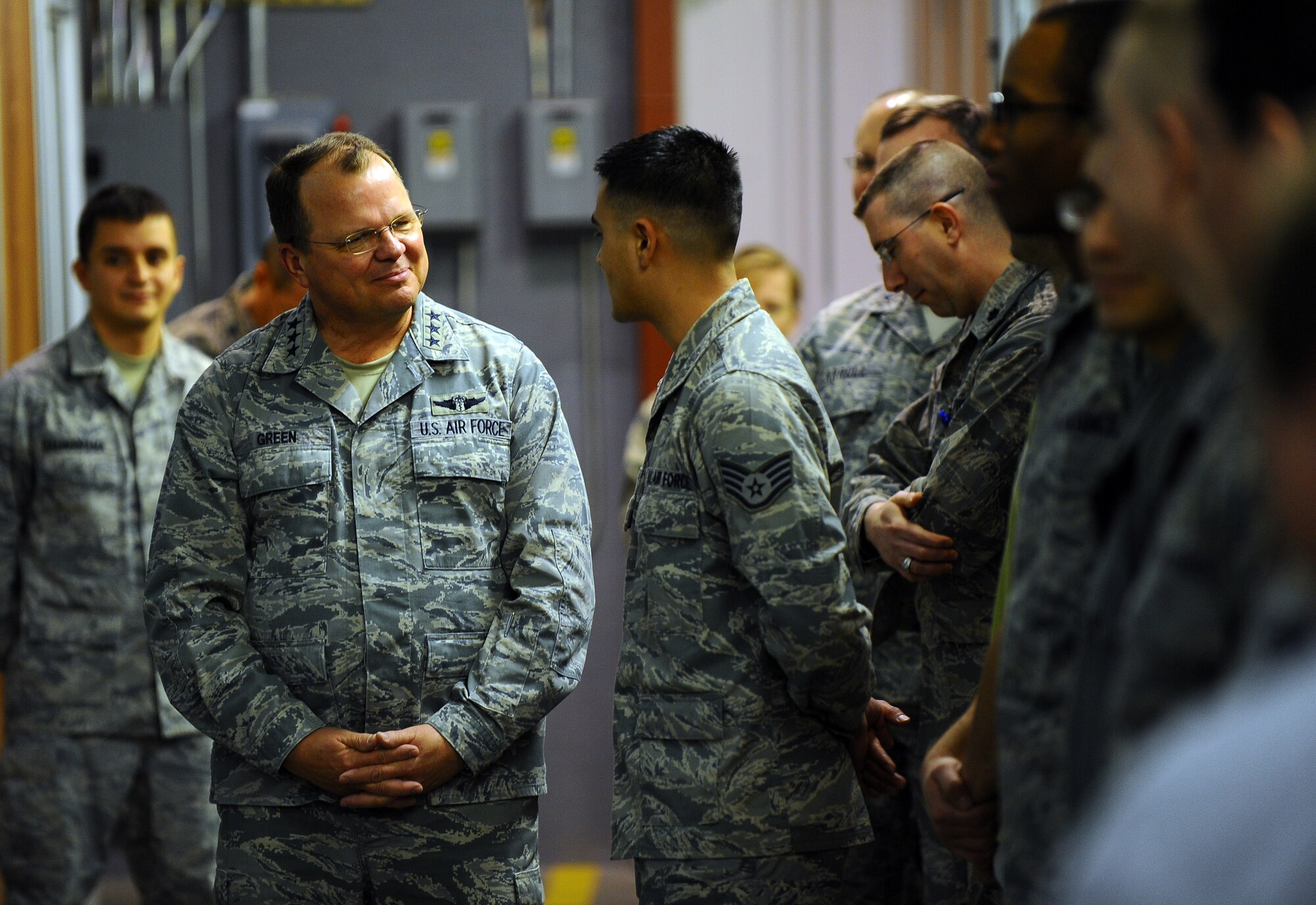 U.S. Air Force Surgeon General Lt. Gen. C. Bruce Green is welcomed by Staff Sgt. Rashad A. El-Jurdi to the medical logistics warehouse during the general's tour of Offutt's Ehrling Bergquist Clinic at Offutt Air Force Base, Neb., Dec. 1. The surgeon general had an opportunity to meet with Airman of the 55th Wing Medical Group during his tour of Offutt. (U.S. Air Force photo by Josh Plueger/Released).