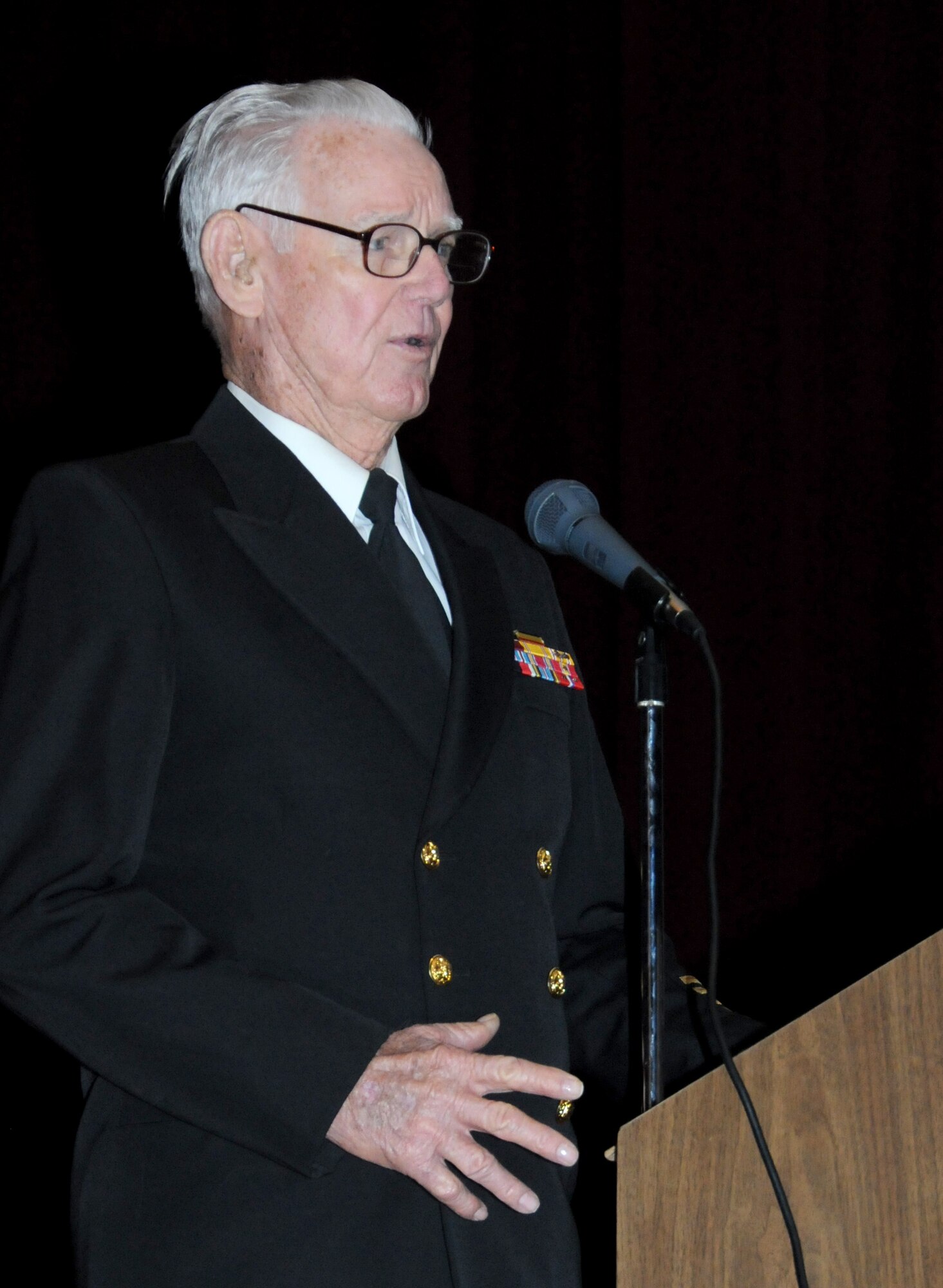 Gunners Mate, Chief Petty Officer, Retired, Hugh Wingo, a resident at the Armed Forces Retirement Home, Gulfport, Miss., was the guest speaker during the Pearl Harbor Remembrance Day Ceremony at the Welch Theater at Keesler Air Force Base, Miss., Dec. 7, 2011.  Wingo, a 94 year old veteran, told his story of what military life was like for him following the attacks.  (U.S. Air Force photo by Kemberly Groue)