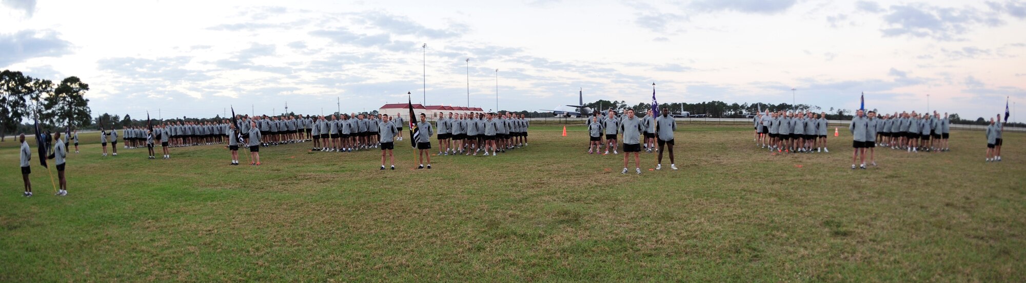 After the 50-mile relay, members of the Joint Communications Support Element stand in formation as Col. Stephen Corcoran, JCSE commander, gives a speech on the history of JCSE.  The JCSE is the premiere joint communications unit in the Department of Defense and provides communications support on short notice in support of Department of Defense missions around the world. (U.S. Air Force Photo by Airman 1st Class Shandresha Mitchell)