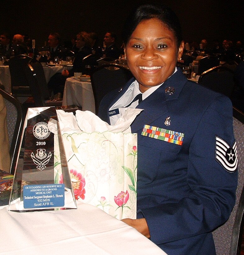 Tech. Sgt. Stephanie Threats was named the 2010 Outstanding Air Reserve Technician (ART), for a ground medical unit in Air Force Reserve Command.  She received her award during a medical conference held in San Antonio, Texas.  Threats credits her supervisor and commander for nominating her.  She is assigned to the 932nd Medical Squadron and works in the command section.  (Courtesy photo provided by Toni Hornbostel)
