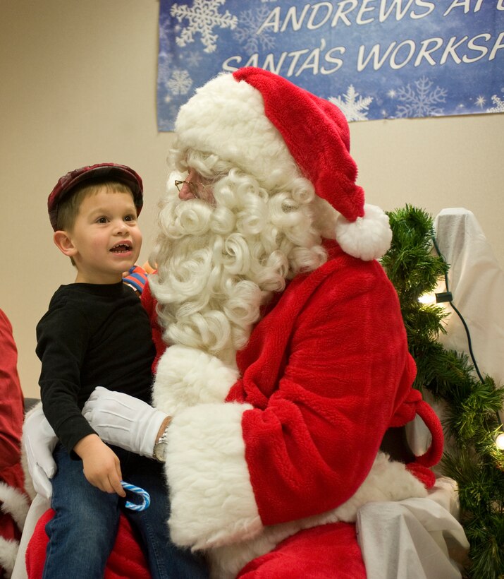Frankie Rivas, 3, gives Santa his Christmas list inside the Andrews Santa’s Workshop, Chapel I on Dec. 1. Frankie is the son of Staff Sgt. Frank Rivas, 11th Wing chaplain assistant. (Photo/Bobby Jones)