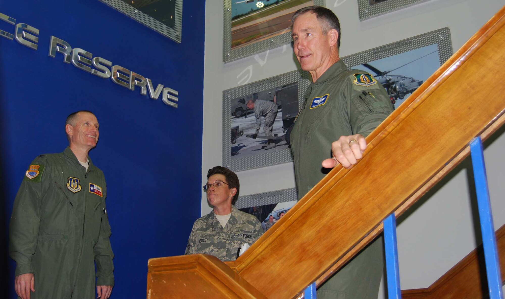 Major Gen. Craig Gourley visits with Col. Kenneth D Lewis Jr., 433rd Airlift Wing Commander and Chief Master Sgt. Julie Begley, 433rd Training Squadron NCOIC, in the Air Force Reserve stairwell of the basic training processing building. Gen Gourley was briefed onthe operations of the 433rd TRS and also had the opportunity to meet with several of the Reserve Military Training Instructors. The Reserve MTIs partner with active duty instructors to push basic military training flights. The 433rd Training Squadron is the only Reserve Military Training Unit of its kind in the Air Force. Gen. Gourley's visit also included a brief stop with the civilian employers who were participants in the 18th annual 433rd Bosses' Day. (U.S. Air Force photo/Senior Airman Viola M. Hernandez)   
