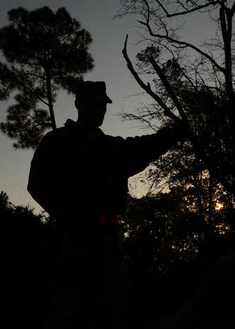 Staff Sgt. Sean Van Ness marshals a forklift to place more sandbags on a truck during the Operational Readiness Inspection at Gulfport, Miss. Dec. 2, 2011. The sandbags were used to build Defensive Fighting Positions for security forces members. Van Ness is a security forces patrolman with the 628th Security Forces Squadron. (U.S. Air Force photo/Staff Sgt. Katie Gieratz)