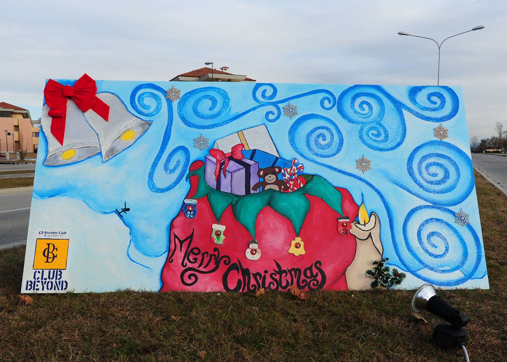 The Club Beyond holiday card is displayed at Aviano Air Base Dec. 6.  Club Beyond members placed second in the annual holiday card contest hosted by the base Community Center. (U.S. Air Force Photo/Staff Sgt. Evelyn Chavez)