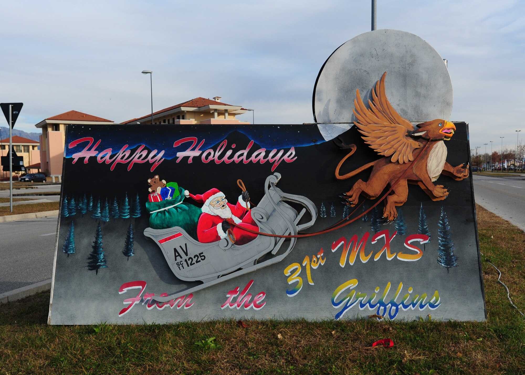 The 31st Maintenance Squadron holiday card is displayed at Aviano Air Base Dec. 6.  Members of the 31st MXS placed first in the annual holiday card contest hosted by the base Community Center. (U.S. Air Force/Staff Sgt. Evelyn Chavez)